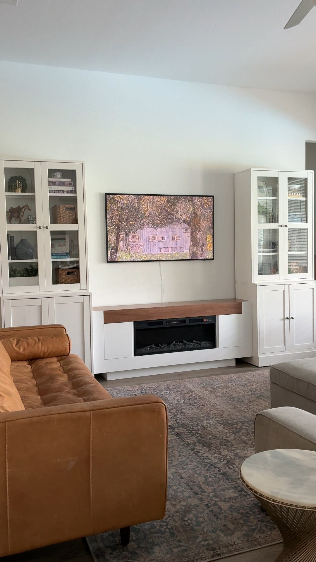 Adding some warmth to my living room just in time for the holiday seasons. It is not cool here in Texas, but I can pretend with this electric fireplace and storage unit.