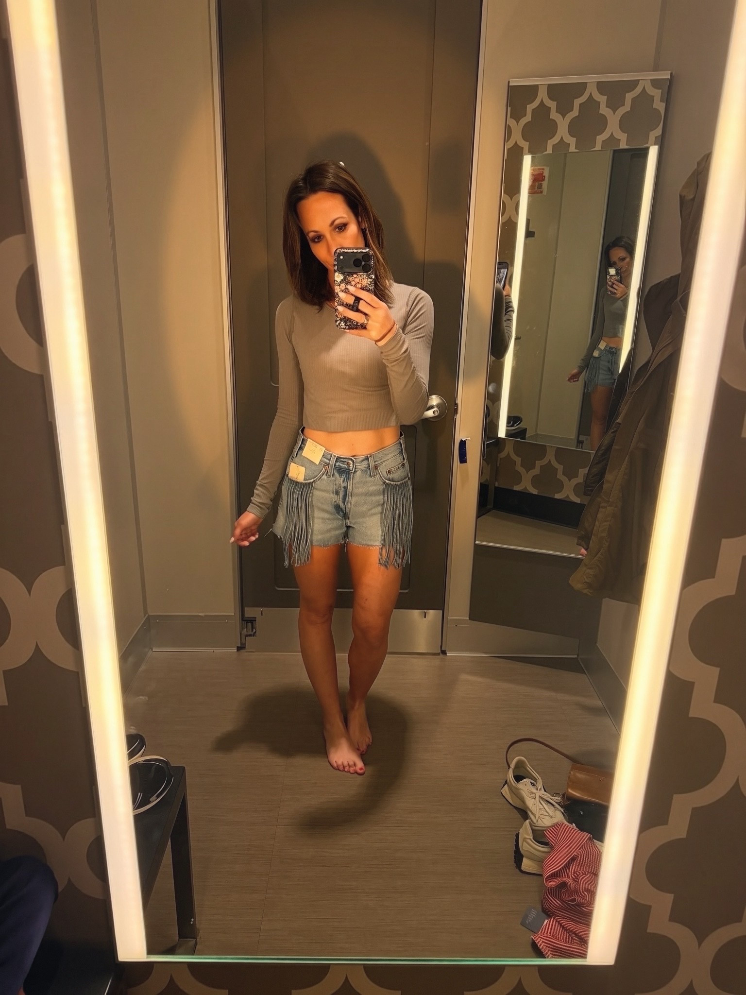OK, these denim jean shorts from target are so good and cute. The fabric is super high-quality and they look like way more expensive denim shorts that you would get at Nordstrom or somewhere. The fringe is super fine for daily, but amazing for a country concert. These with cowboy boots and a white tank and a cowboy hat is just about perfection.

#LTKOver40 #LTKSeasonal #LTKTravel