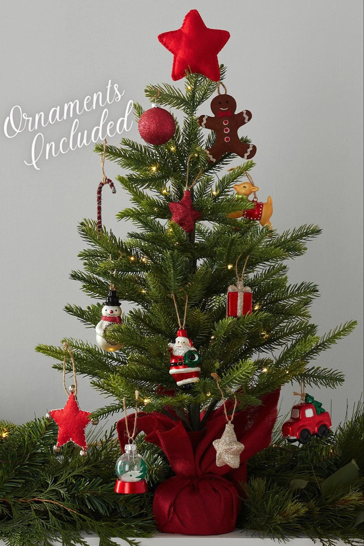 This adorable mini tree is a dream Christmas tree for little ones. This cheerful tree includes 18 red and white themed ornaments, 45 LED warm lights and topped with a felt red star tree topper. The joy and magic of the season will come to life as the kiddos decorate this tree and when they switch it on the sparkle and glow from the ornaments and lights will enhance the holiday cheer. The burlap covered base will hold the tree securely in place and it includes a timer (6 hours on/18 hours off).

#LTKhome #LTKHoliday #LTKkids