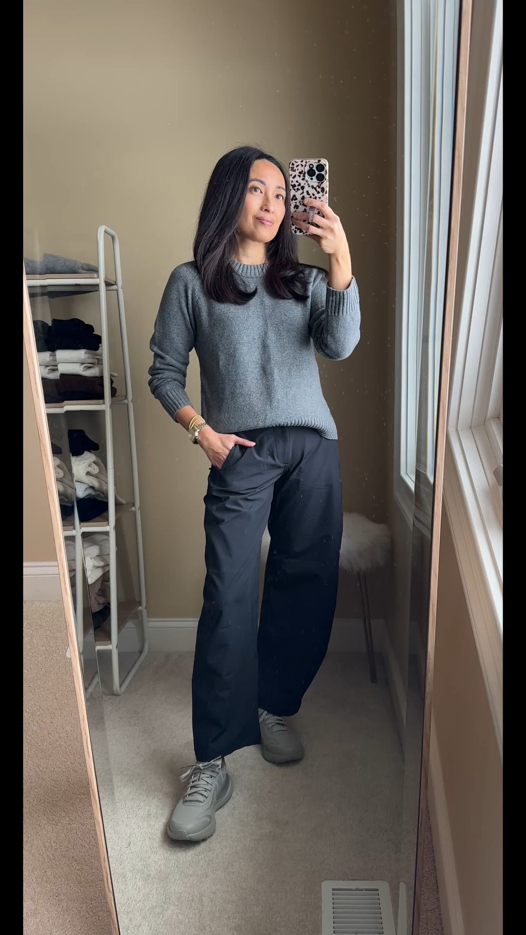 Athleisure outfit. Travel pants. 
Crew neck sweater with soft cashmere-like feel. I got this last year in true to size and I got it in black this season in a size up. 
Athleisure pants in a cute barrel cut. Lined with a soft lightweight terry material. Warm for winter. SIZE DOWN. Wearing regular length; also comes in tall and petite. 
Waterproof sneakers. I have been looking for travel shoes that are comfy and waterproof. These feel great on. Have been wearing in the house; reviews say they are indeed waterproof. True to size; size up if in between. 
Ruffle socks. 


#LTKOver40 #LTKootd #LTKTravel
