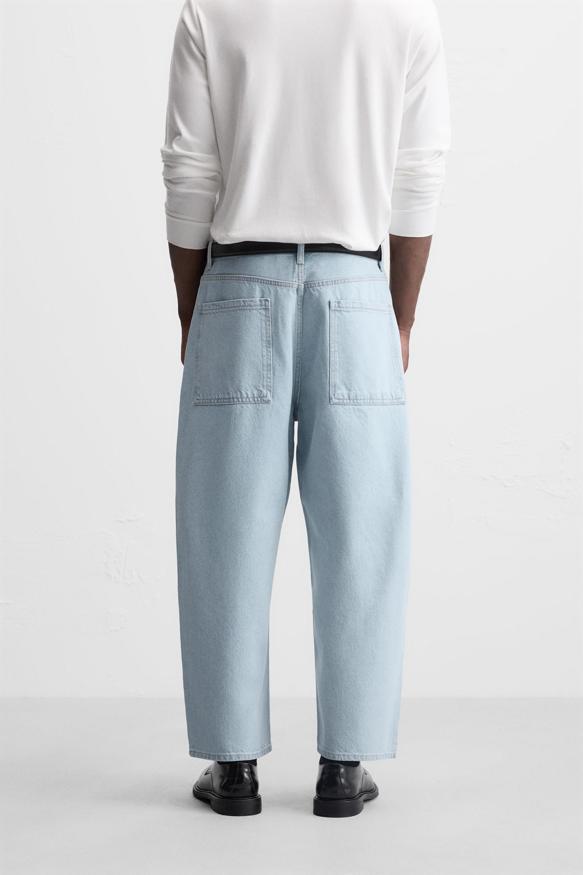 Tapered wide leg jeans. Five pockets. Washed effect. Front zip and button closure. | Zara US