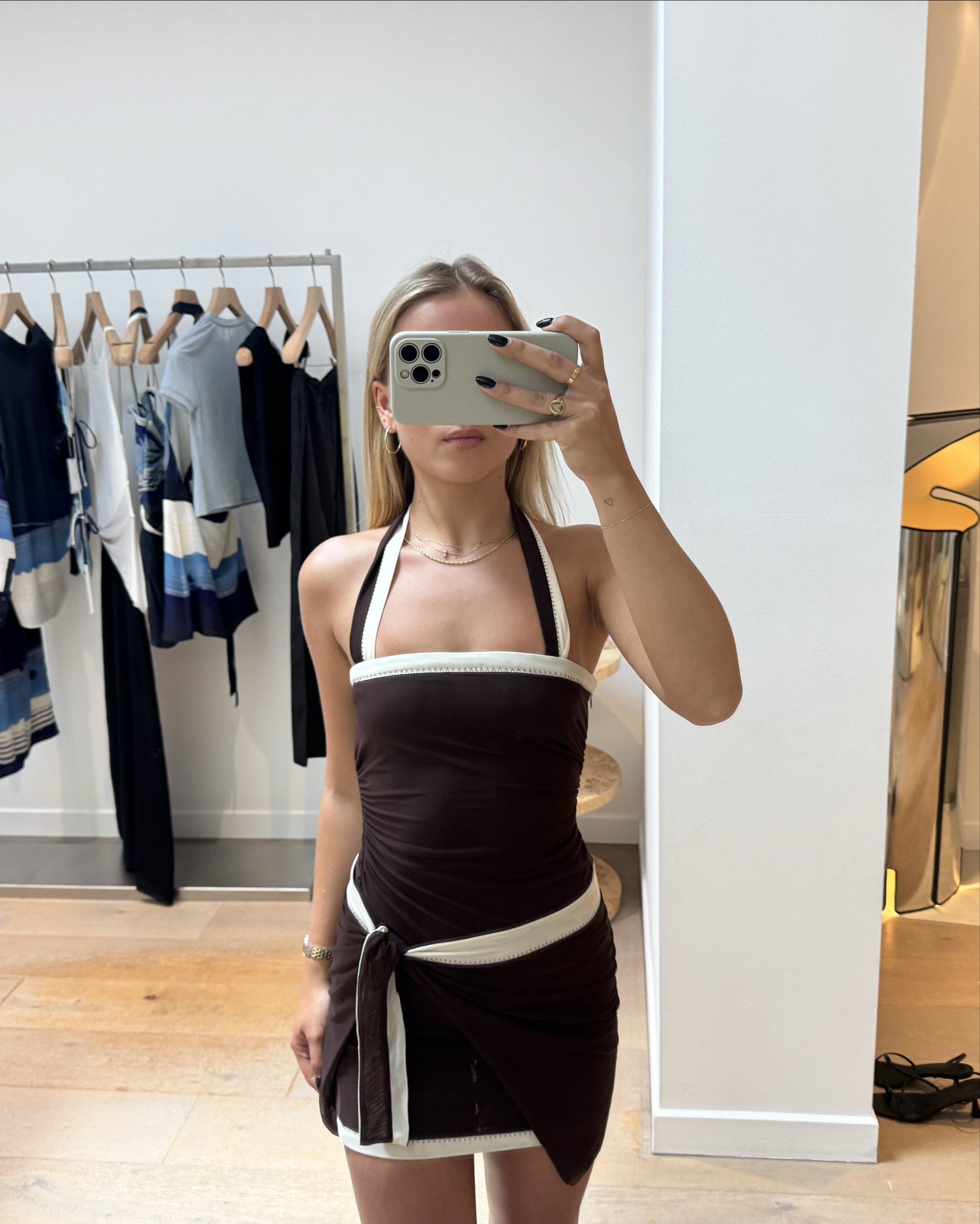 The cutest chocolate mini!!! Love the halter neck and the wrap skirt 🤎🤍 this one will be my go-to this summer.
I wear a size 0 

#LTKsummer #LTKaustralia #LTKstyletip