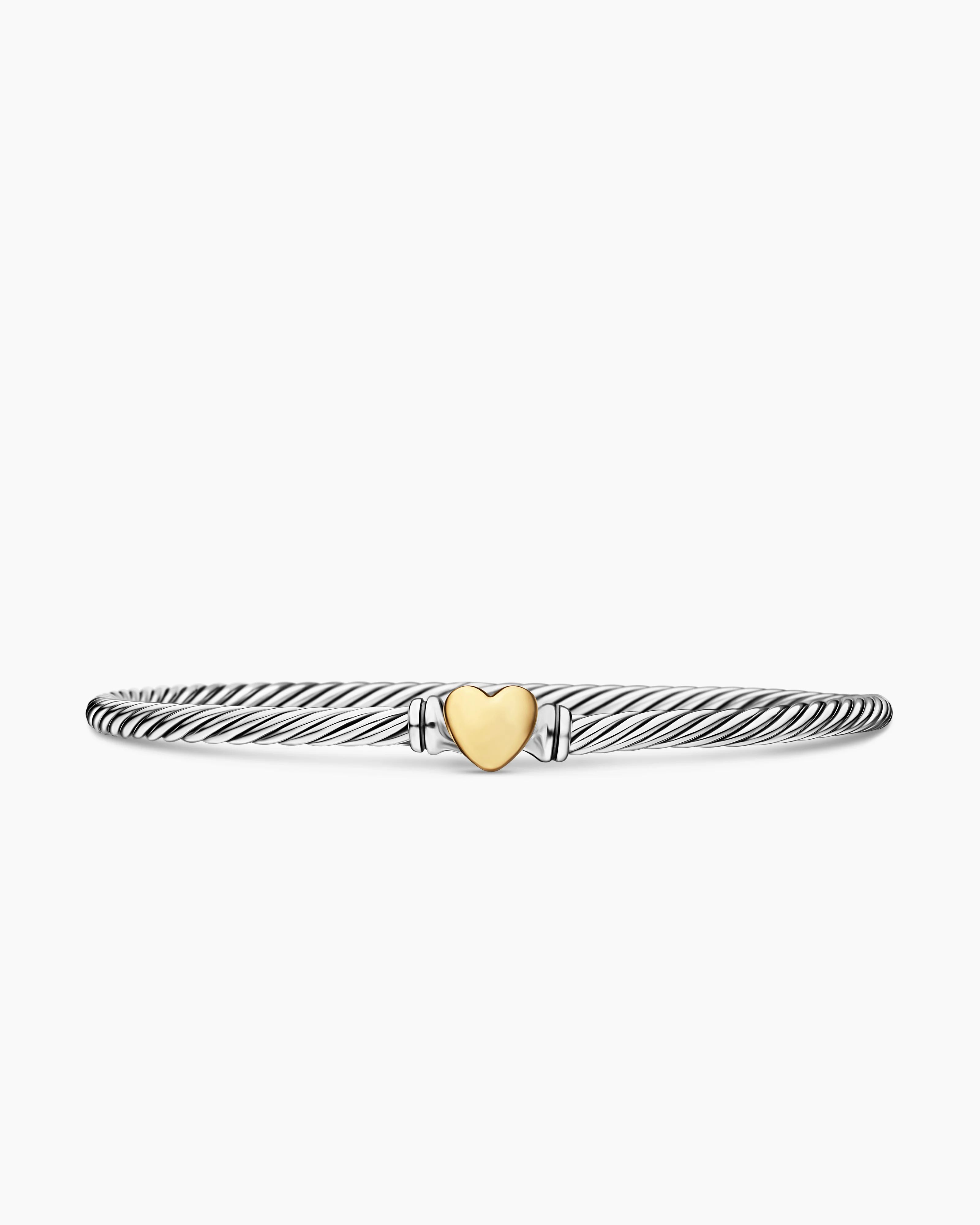 Cable Collectibles® Heart Bracelet

Sterling Silver with 18K Yellow Gold, 3mm | David Yurman