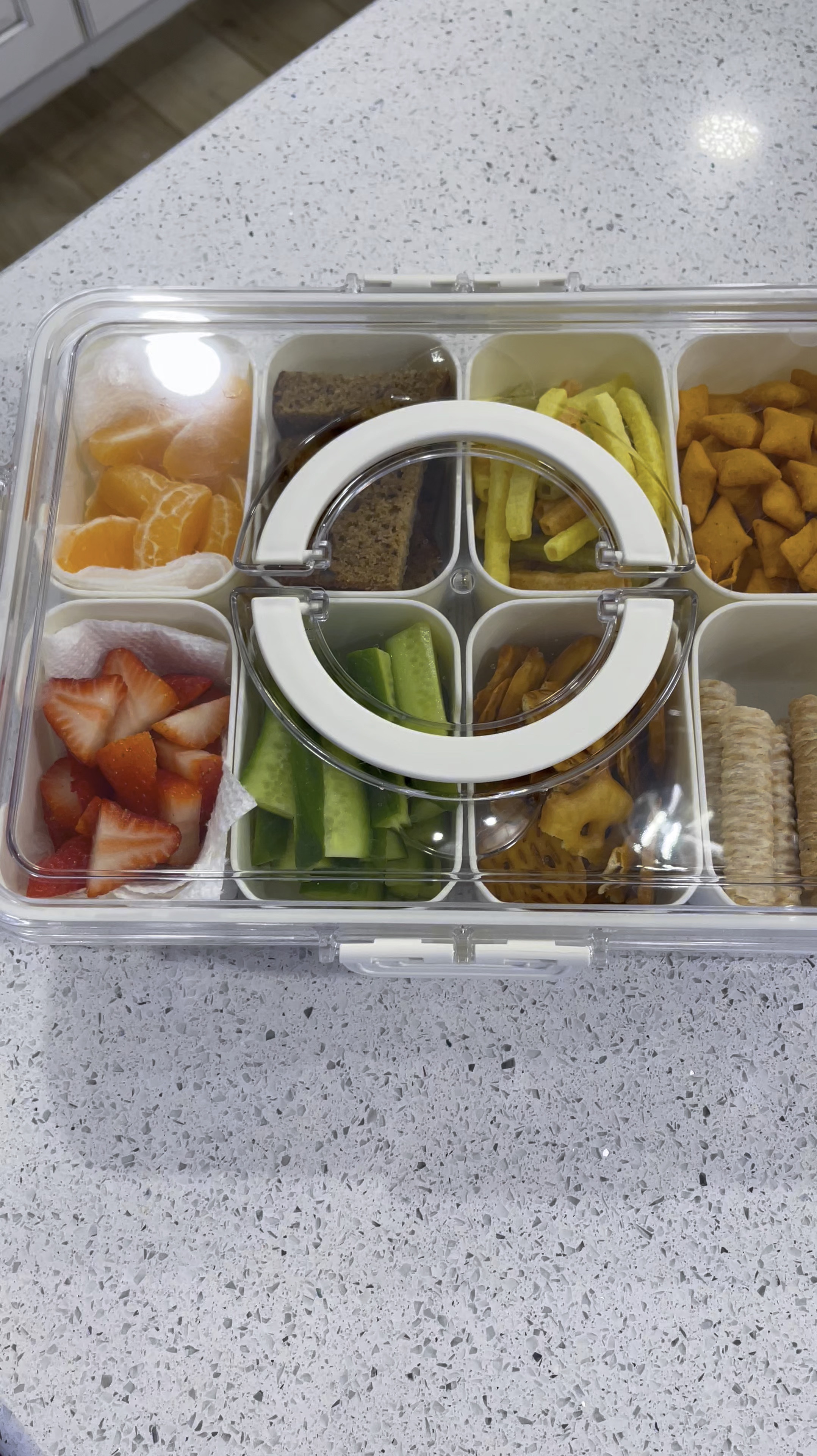 Found the perfect serving tray for play dates! This snackle box has 8 compartments that are perfect for sliced fruit, pretzels, chips, nuts, veggie straws, and more 😍🫶 

Love the snaps on each side of the lid and the carrying handles for easy transporting and packing - I could see using this in a road trip or picnic day too!

Under $20 find 🩷🩷🩷🩷


#LTKFamily #LTKTravel #LTKHome