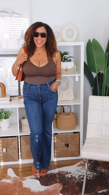 A bodysuit + jeans is always a winning combo! 🤎#ad Got the Honeylove Cami Bodysuit in Espresso☕️! This bodysuit is giving: 
🍯 - Smoothing balanced with stretch 
🍯 - Structure and support (means no bra needed) with a built in bust support
🍯 - Adjustable straps for the perfect fit 
I got an xl  and it was perfect! 

💥Hey 👋🏾 Use promo code LIVBYVIV for 15% off!! 💥

#LTKVideo #LTKMidsize