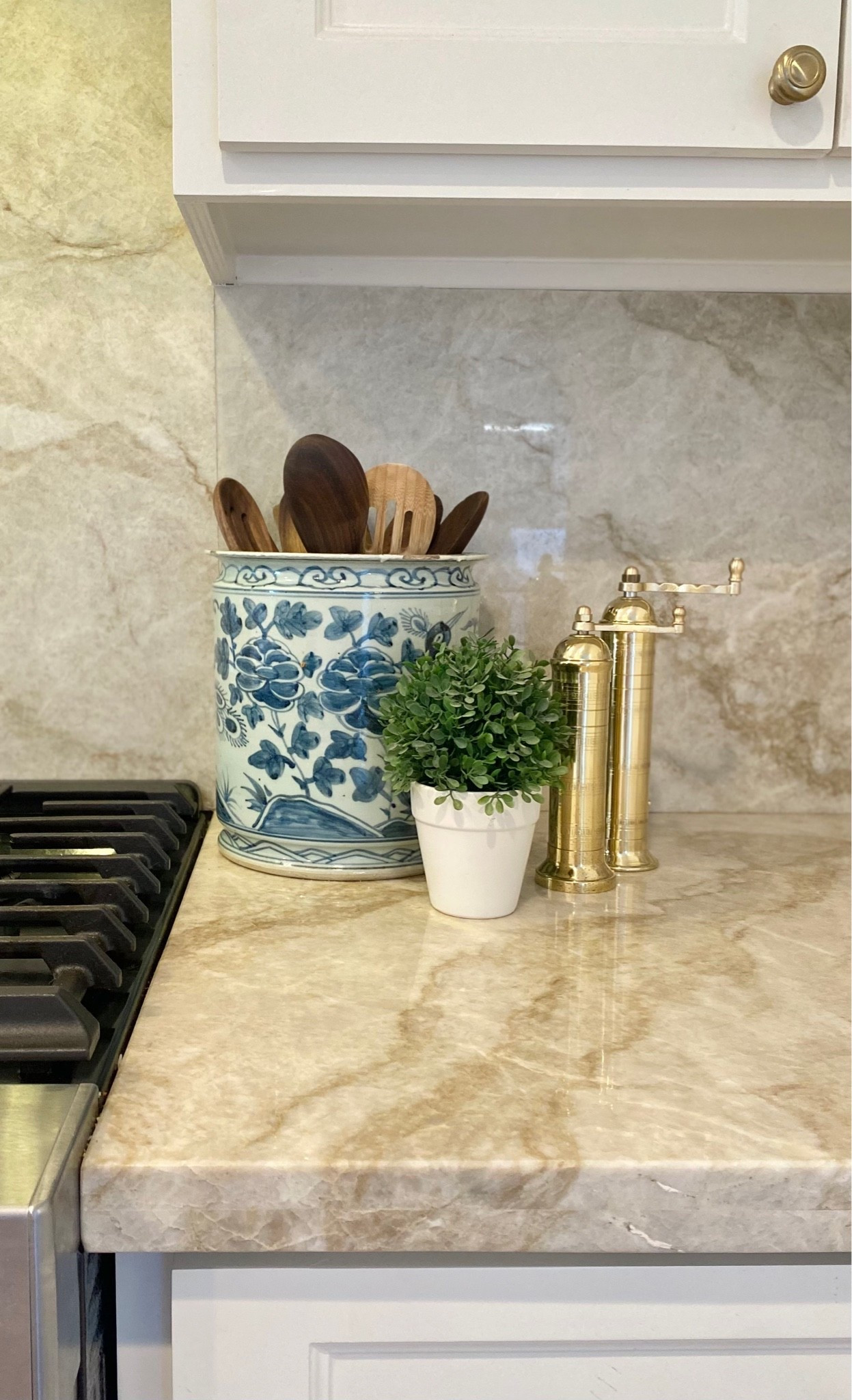Orchid pot I use as a wooden spoon holder in my kitchen is discounted right now with code "SUNNY"