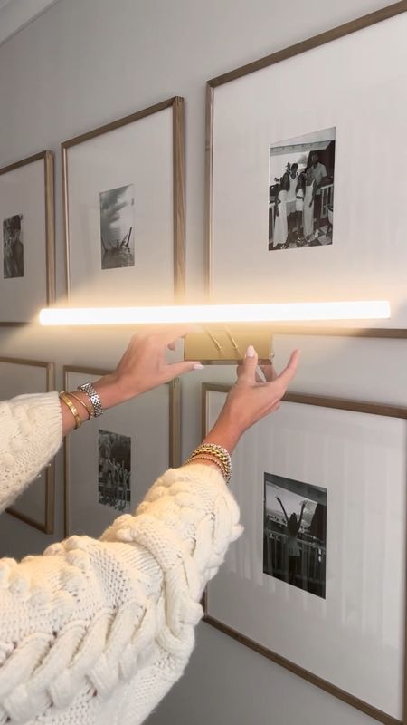Picture lights - rechargeable lights for gallery walls

3 metals and easy to install! Similar to the wall sconces I installed on the past reel 

Picture frames in grey with the 8x10 mat frames are 25x25

#LTKhome #LTKHolidaySale