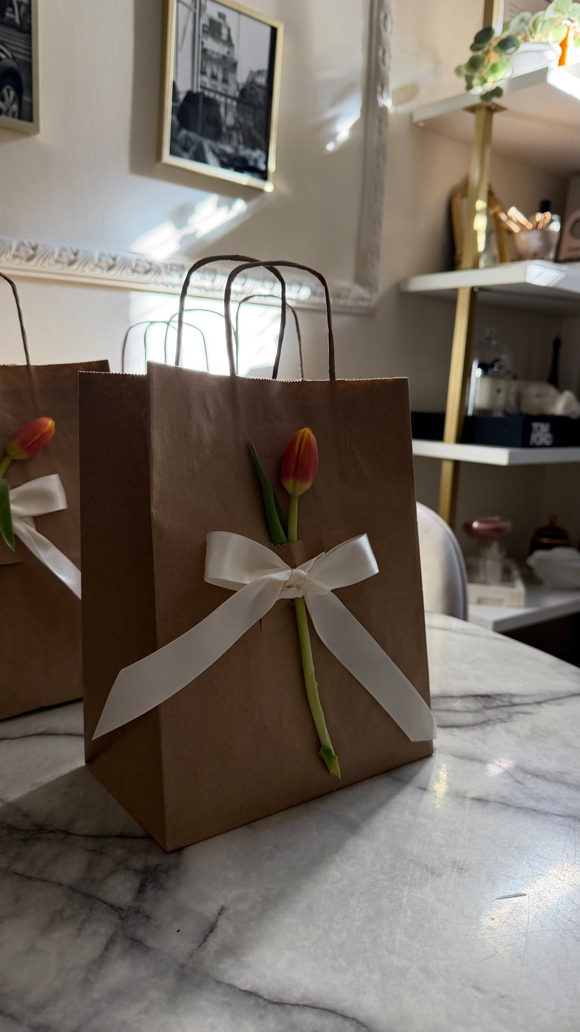 Simple details make the prettiest gifts. Brown paper, soft tulips & ribbon tied to perfection.

#giftwrappingideas #aestheticgiftwrap #diygiftwrap #wrappinginspiration #giftpresentation

#LTKHome