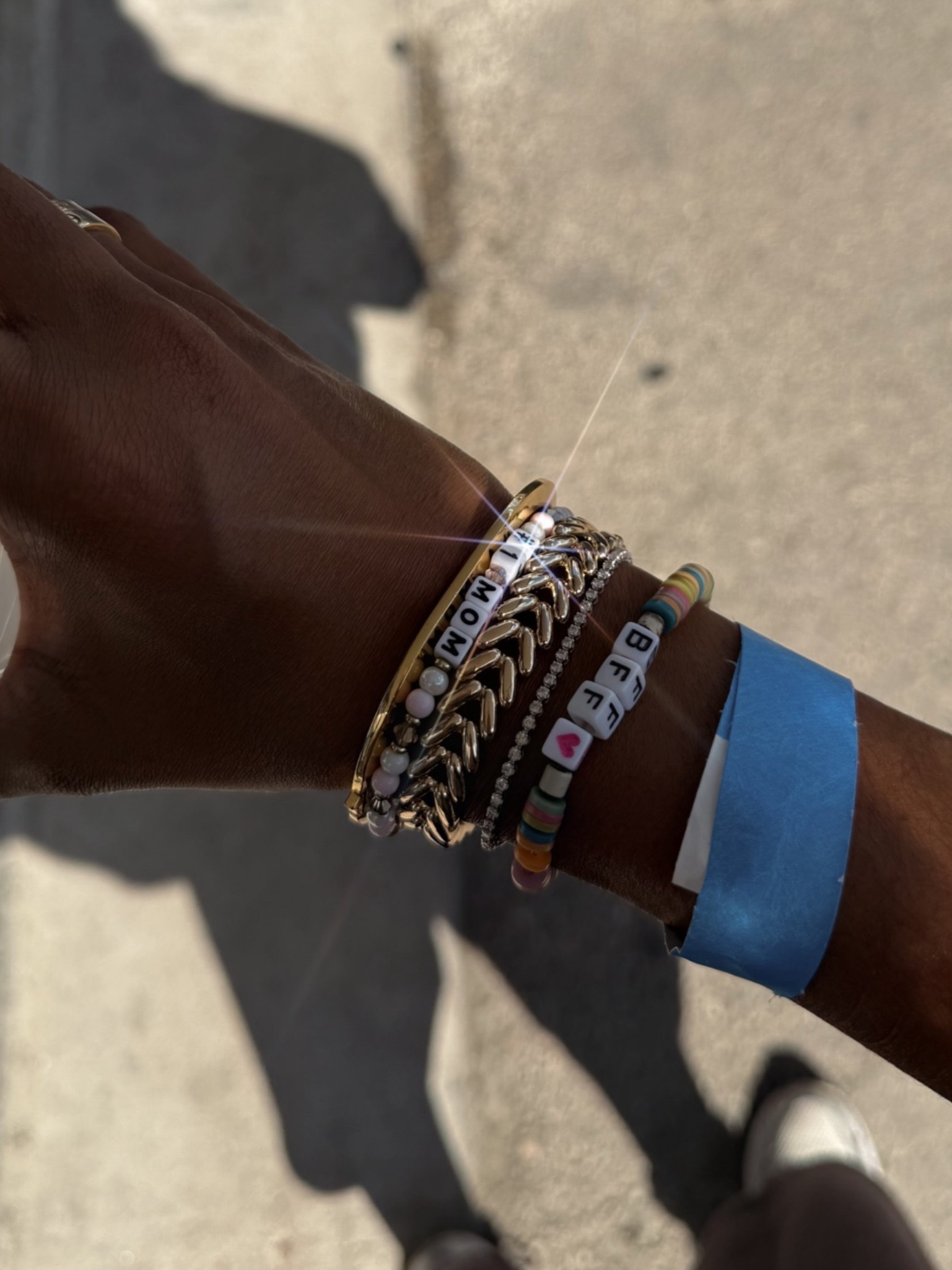 My mom stack! Tournament blue paper bracelet not included ☺️ the BFF bracelet is custom, made by my daughter🫶🏾✨