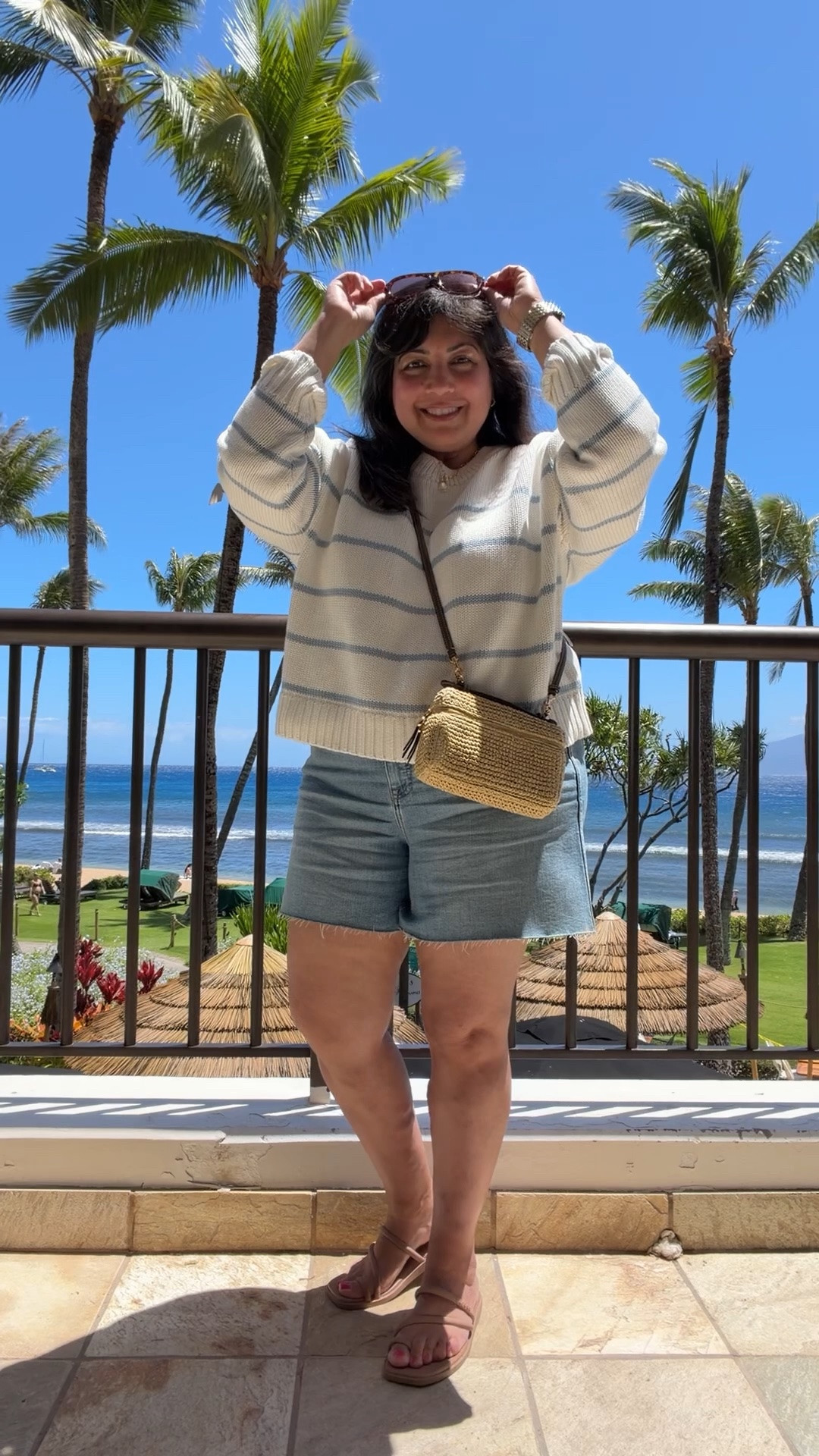 The perfect summer sweater for cool evenings at the beach that will also transition really well into fall! Love the stripes and this color combo.  Perfect with a pair of denim shorts for a casual summer look! It would also be cute with regular jeans as an early fall outfit and great with white denim jeans too. This sweater is great for trips to the lake and beach. Such a great summer layer for cool days and evenings and the cutest summer outfit! Great to drape over your shoulders with a tee or tank top too.

Quince striped summer sweater size large. Tommy Bahama jean shorts. I sized up for a roomier fit. Crocs toe loop strappy sandals. Tory Burch raffia crossbody bag. Madewell aviator sunglasses.

Vacation outfits beach, beach vacation outfits, summer outfits, denim shorts, midsize outfits, petite outfits, over 40 style, over 50 outfits, early fall outfit, fall transition outfit

#LTKOver40 #LTKMidsize #LTKPetite