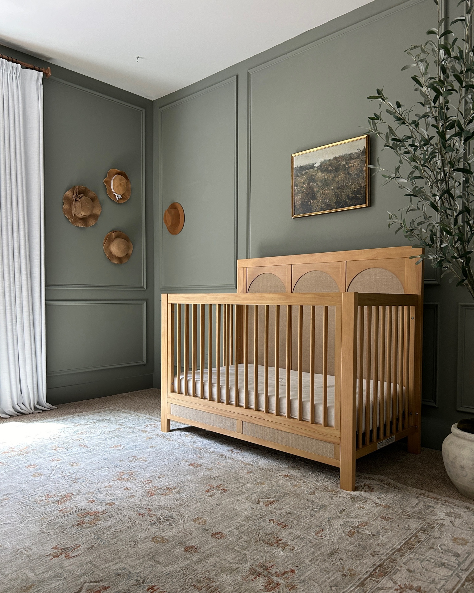 Our simple but oh so sweet nursery 💕 I knew I wanted something that felt elevated and safe green just felt right this time around. 🤍🤍 I am still not over our furniture set from Namesake

#Homedecorinspo #modernorganic #homeinspo #neutralhome #homedecor #studiomcgee #targetfinds #amazonfinds #homeswithpurpose #atlanta #atlantadesigner #georgia #us 

#LTKHome #LTKBump #LTKBaby