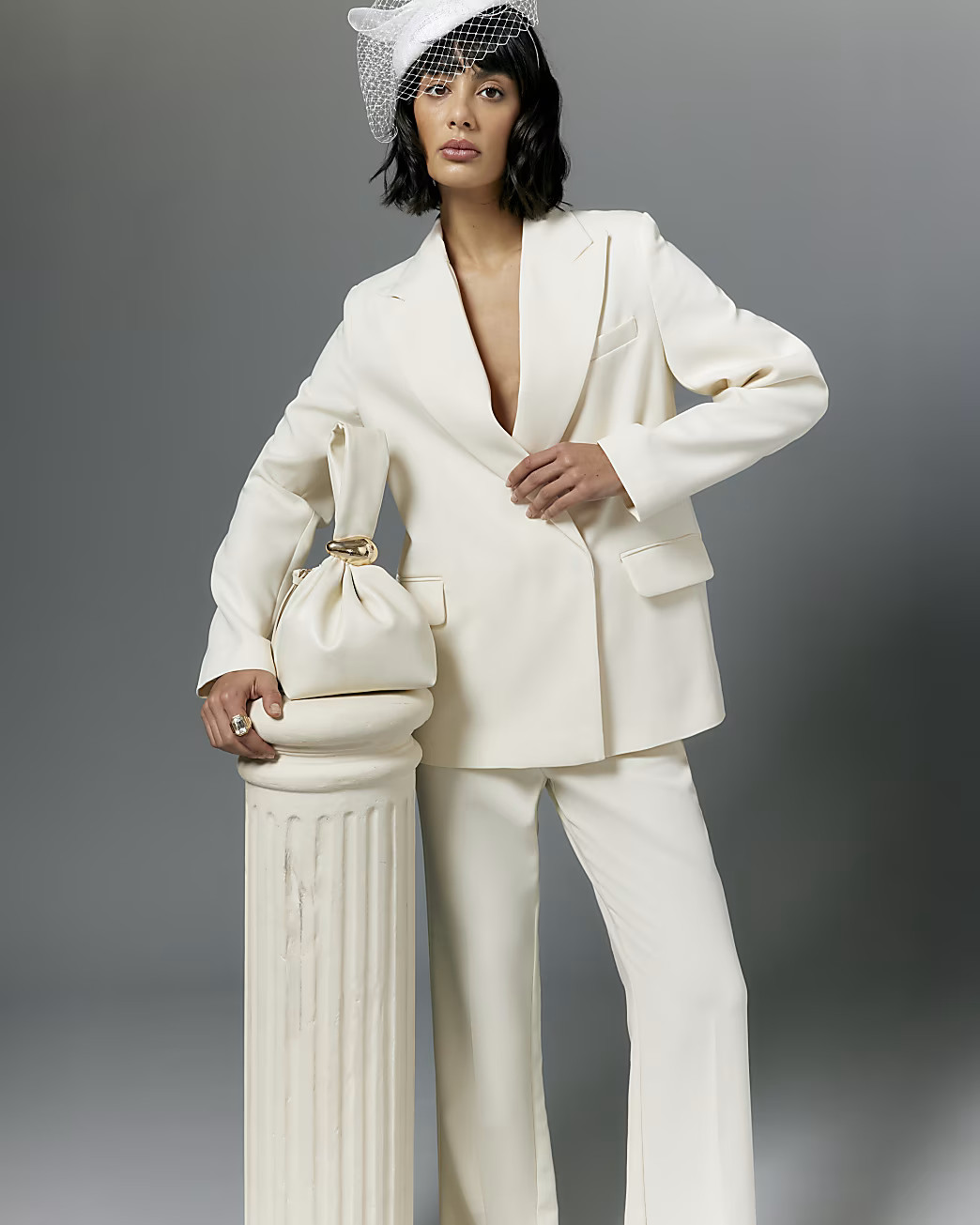 Cream Slim Fit Flared Trousers | River Island UK & IE