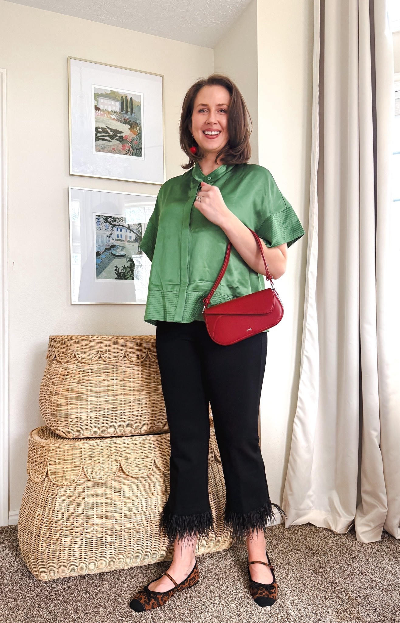 A spring outfit for work or the weekend. Ive paired my favorite feather trimmed pants with a red leather bag, satin shirt, C Parvano ballet flats, and cherry red earrings.

#date night outfits #spring outfits 2026 #business casual workwear 
#ltkshoecrush
@ltk

#LTKTall #LTKootd #LTKOver40