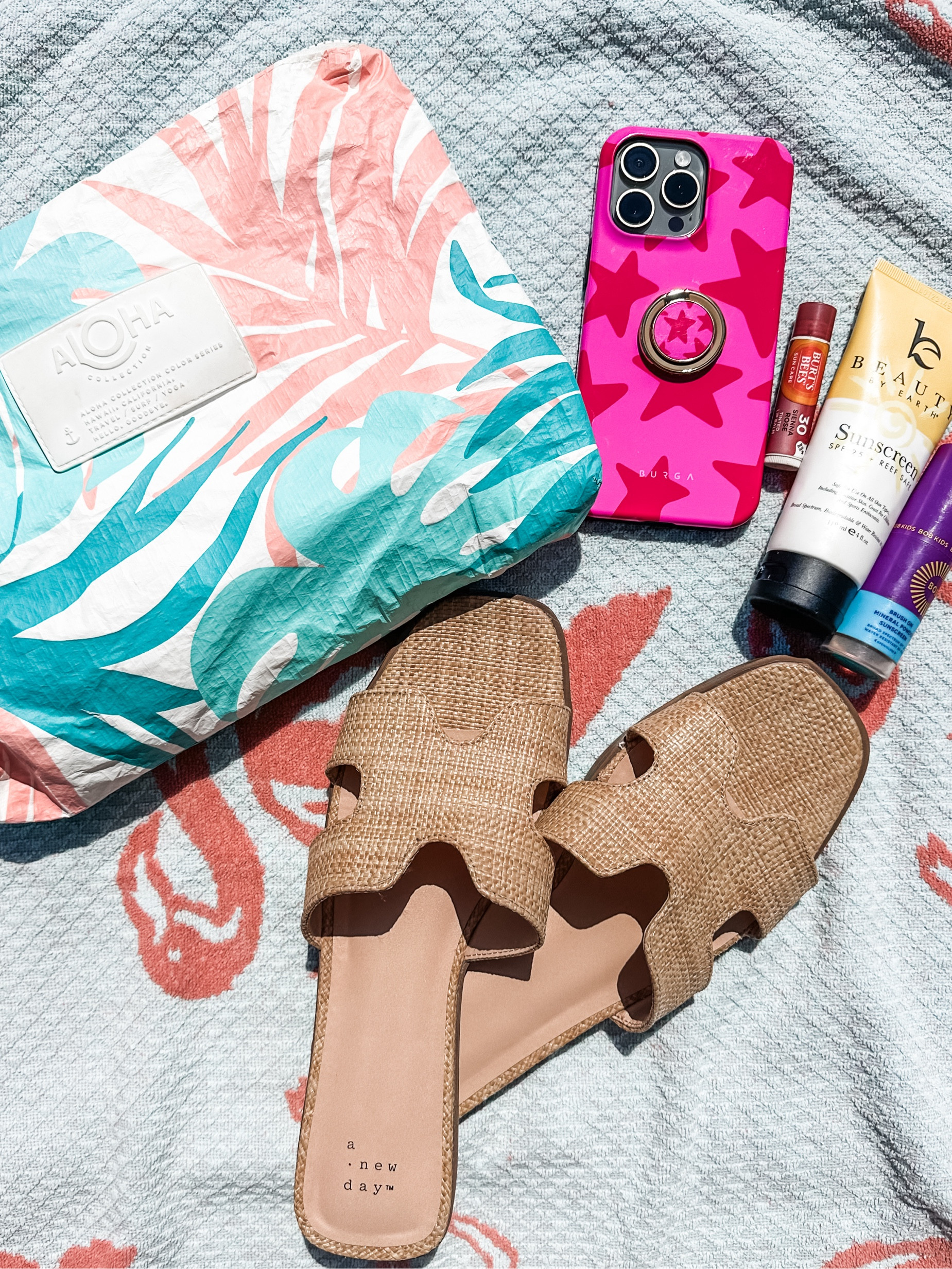 Sandals and poolside essentials. My Aloha bag would be a great gift for Mother’s Day as it is waterproof and perfect for keeping things dry by the pool or to even store wet suits in after a day by the water! Explore their whole line and the few bags I have linked below to complete your beach gear essentials for summer. 

#LTKShoeCrush #LTKSwim #LTKGiftGuide