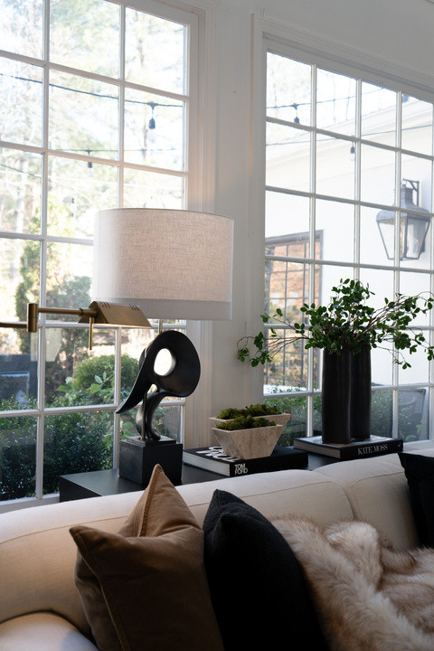 Eeeekk! I am beyond obsessed with this styled window nook!! Soft neutral palette, black accent decor, textured throws, modern lighting and fresh greenery creating the dream cozy interior design moment. It feels warm, clean, elevated and like a luxury home photoshoot right in my living room!  

 #LTKvlog #LTKU #LTKHome