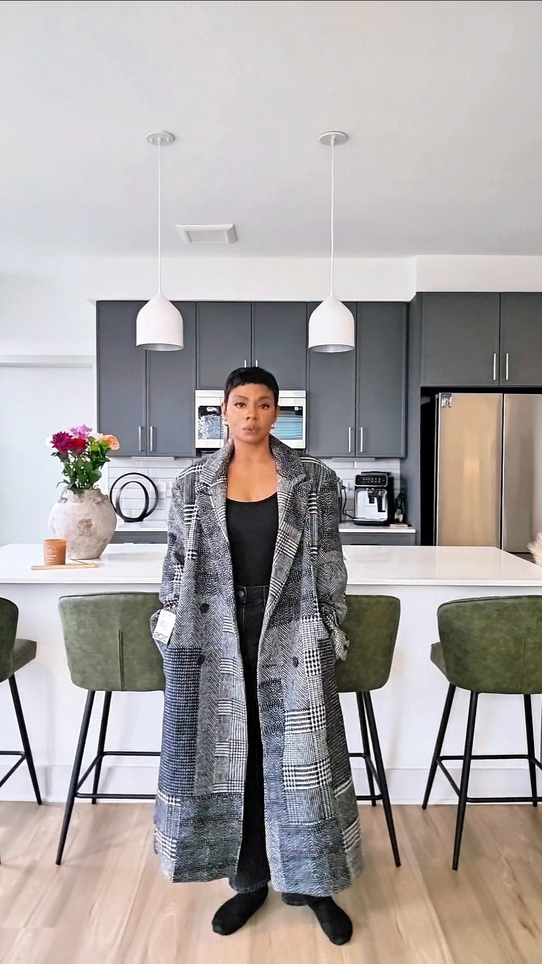 Patchwork Plaid Maxi Coat | This oversized patchwork plaid maxi coat is giving all the winter statement vibes. Can be dressed up or down.Styling tip: Wear it with chunky boots and a fitted turtleneck to balance the oversized silhouette, or dress it up with heels for a night out. The white and black splice/check design adds a fun twist to the classic plaid look, and the oversized dad coat shape keeps you cozy while still looking chic. Perfect for street style, layering over your winter wardrobe, or just making every outfit feel intentional. How would you style Size: S | Plaid Coat, Plaid Maxi, Checkered Maxi Coat 

#LTKPetite #LTKootd #LTKgrwm