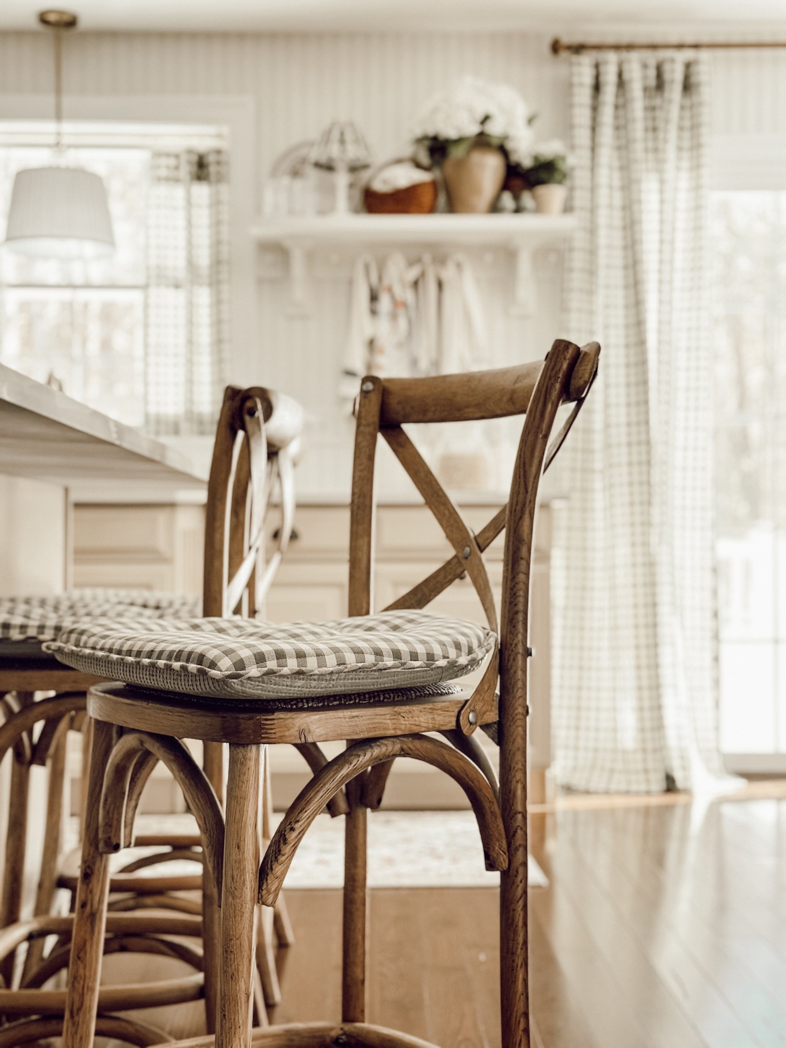 Our new chair pads from Amazon go so well with our gingham kitchen curtains. 

#LTKHome