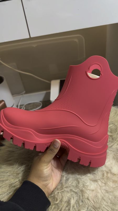 Step into style with a pop of color! These hot pink Moncler rain boots are the ultimate statement piece for rainy days. #RainyDayChic #MonclerMagic #SplashOfColor 💖🌧️

#LTKSeasonal