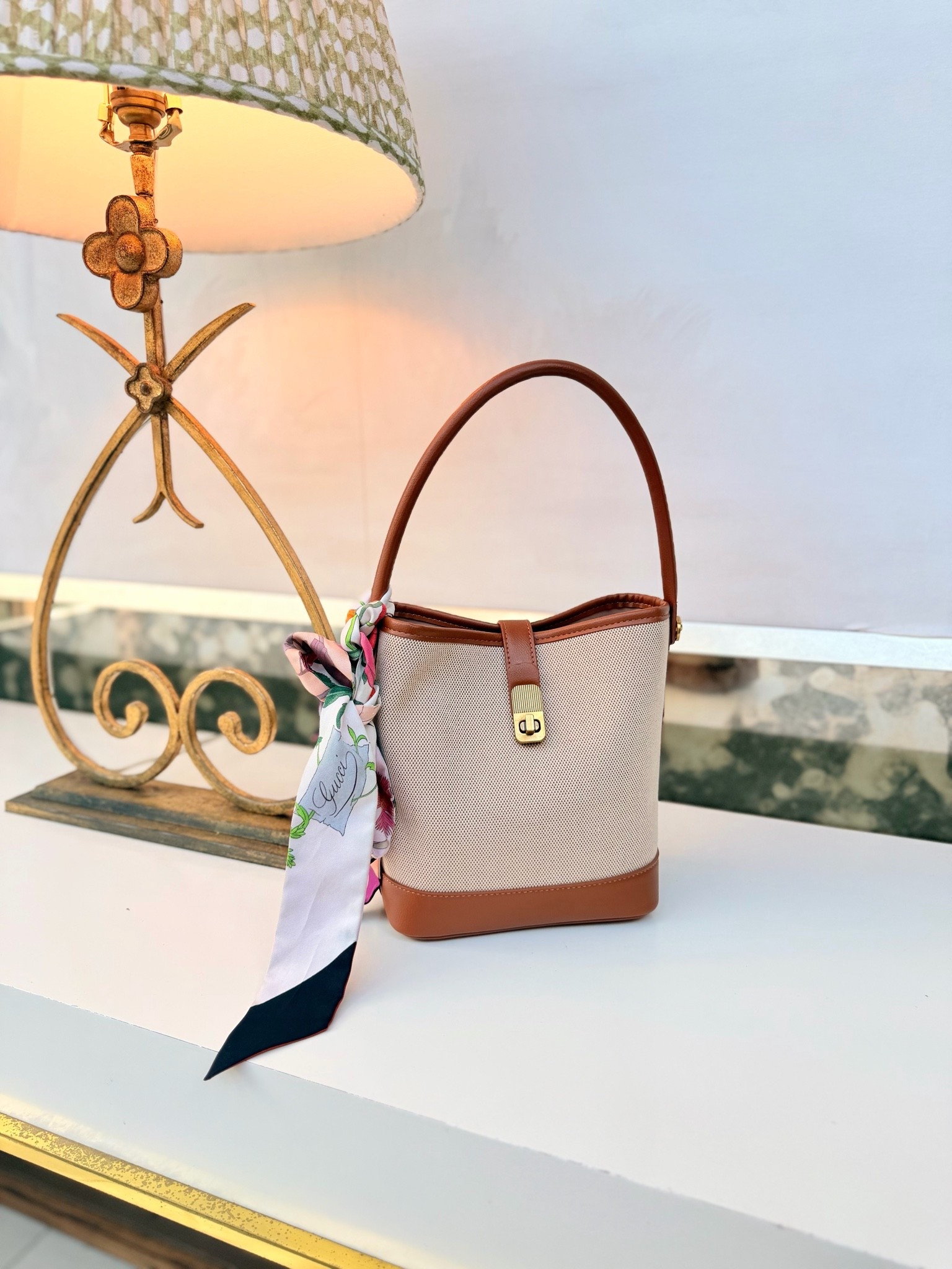 Adding a designer scarf to an Amazon handbag is kinda chic 😌

#LTKootd