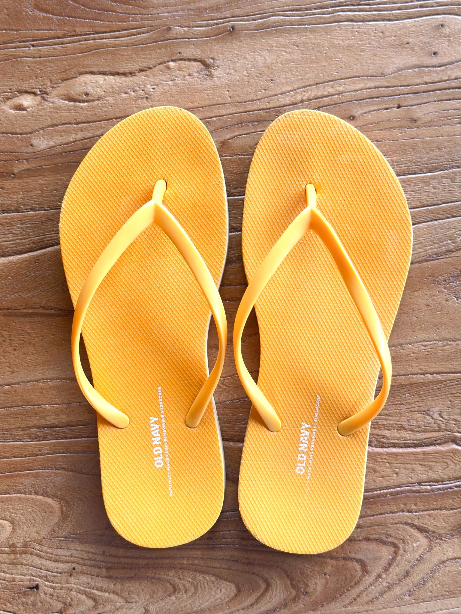My daughter was SO excited when she was able to fit into the adult size flip flops at old navy! 🤣
She had to get this pair in her favorite color! 🧡
#oldnavy #flipflops #sandals #summer #beach #like #comment #save #share #follow 

#LTKTravel #LTKFindsUnder50 #LTKFindsUnder100