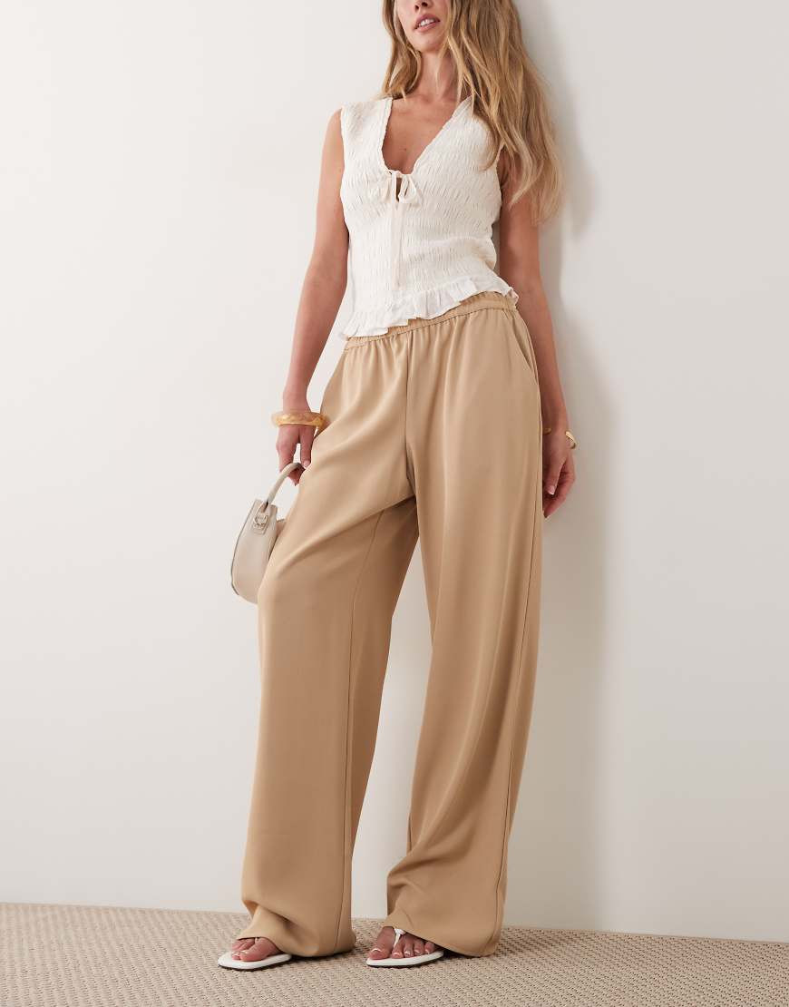 River Island soft crepe wide leg trouser with elasticated waist in brown | ASOS (Global)