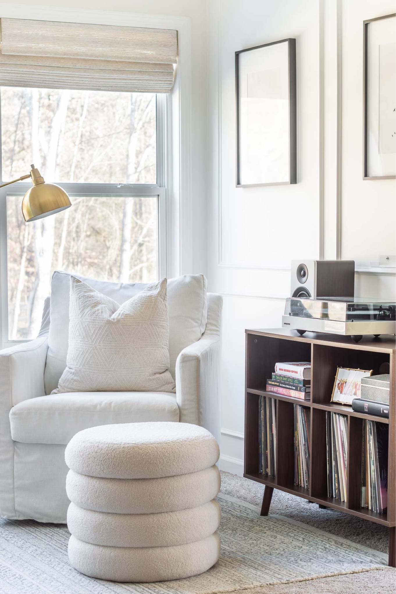 My little reading corner has evolved into a reading/listening corner, thanks to my new found passion of vinyl. I’ve added an open shelf cabinet, turntable and speakers to the space, along with an acrylic vinyl shelf to hold the “now playing” album sleeve. home decor sitting room decor reading nook vinyl storage record album storage area rug boucle storage ottoman floor lamp wall art Wayfair find#LTKStyleTip

#LTKHome
