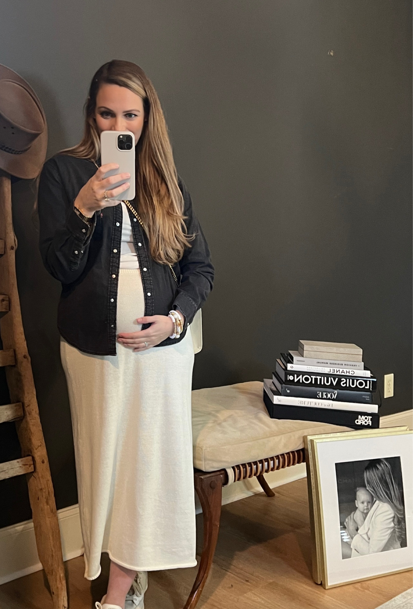 Styling this knit white midi skirt in a casual way for weekend errands perfect for maternity comfort! Paired with a simple white v-neck and little black denim button-down that I’ve left open and my most favorite white sneaks!

Maternity looks. 
Maternity style. 
Casual looks. 
Effortless style. 