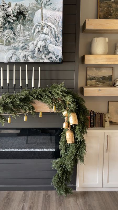 Beautiful Christmas holiday mantle styling with cedar garland, vintage bells, and stockings

#LTKSeasonal #LTKHoliday #LTKhome