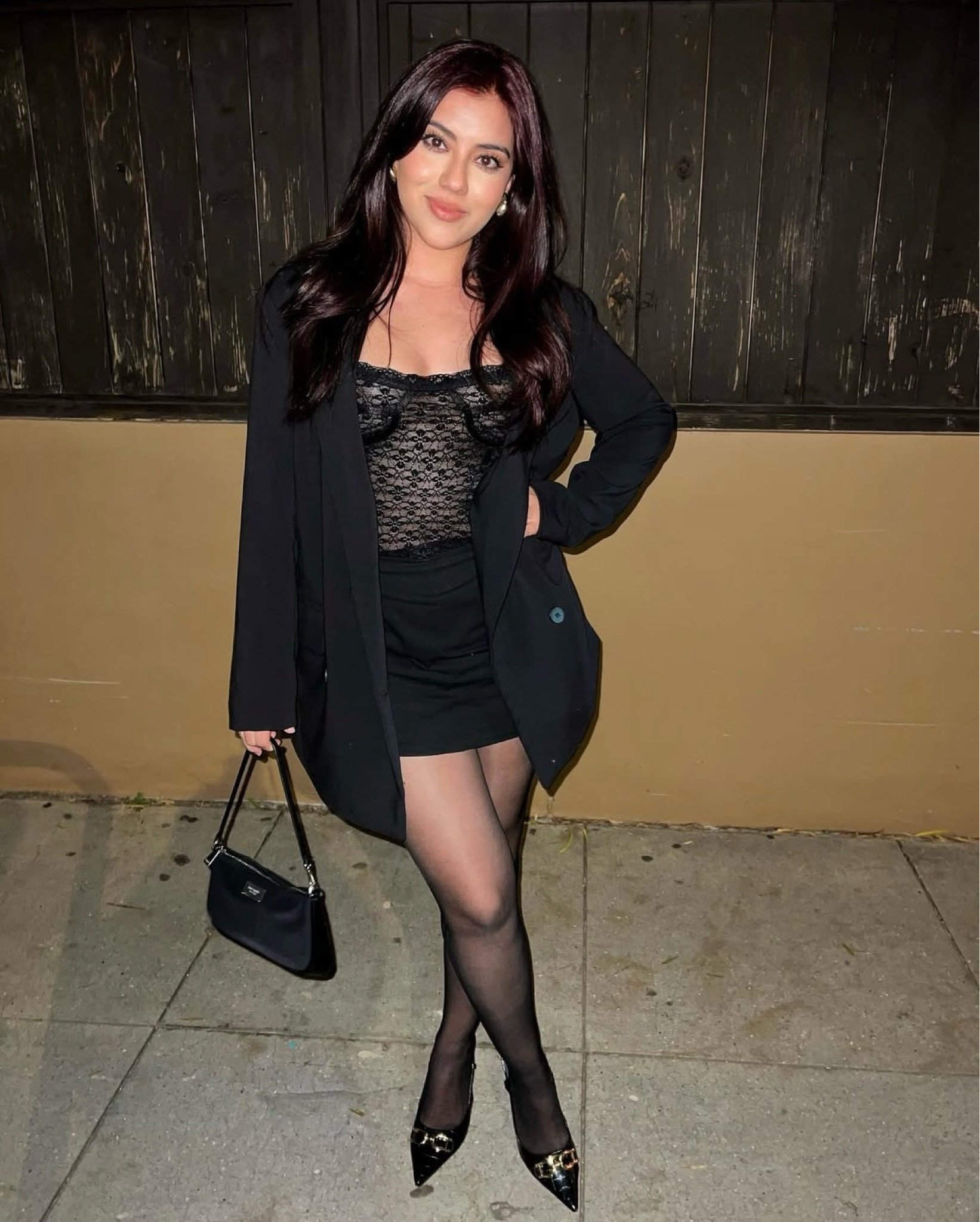 Effortless elegance meets a little edge. Dressed in all black with lace, gold details, and a chic mini bag. Night out, but make it timeless. ✨🖤 #valentinesday #galentines #nightoutoutfit 

#LTKFindsUnder100