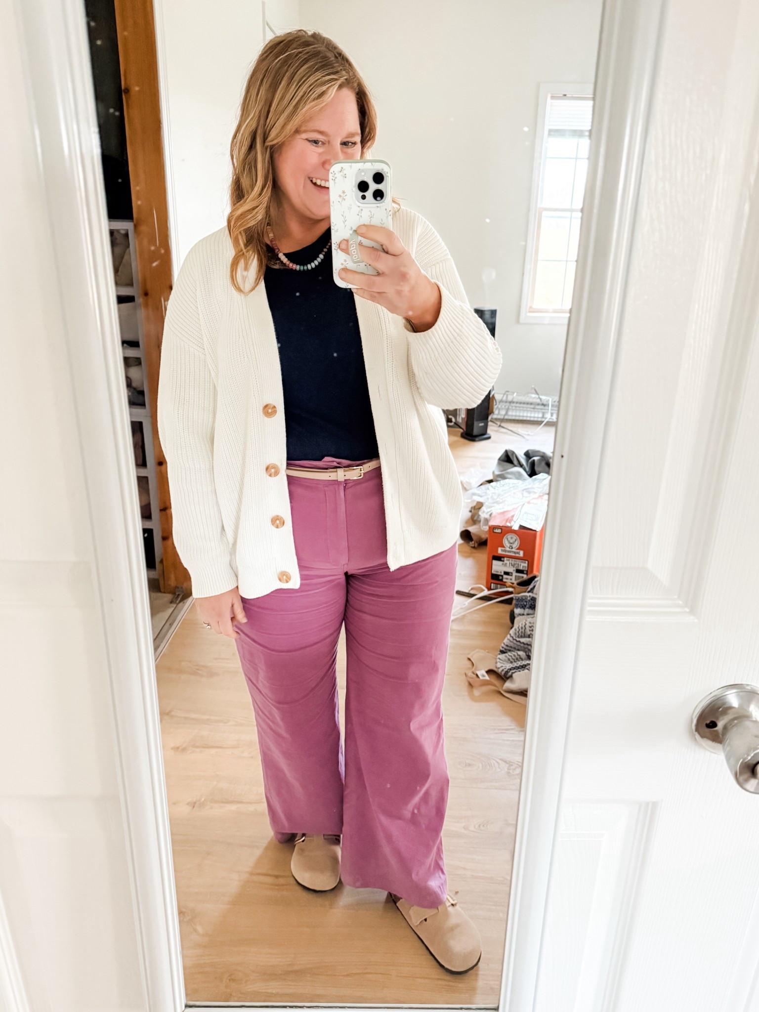 Teacher outfit! Hard to tell but my tank is actually navy.  Wearing an XL in my sweater and a 33 short in my pants.  

#LTKSaleAlert #LTKWorkwear #LTKMidsize