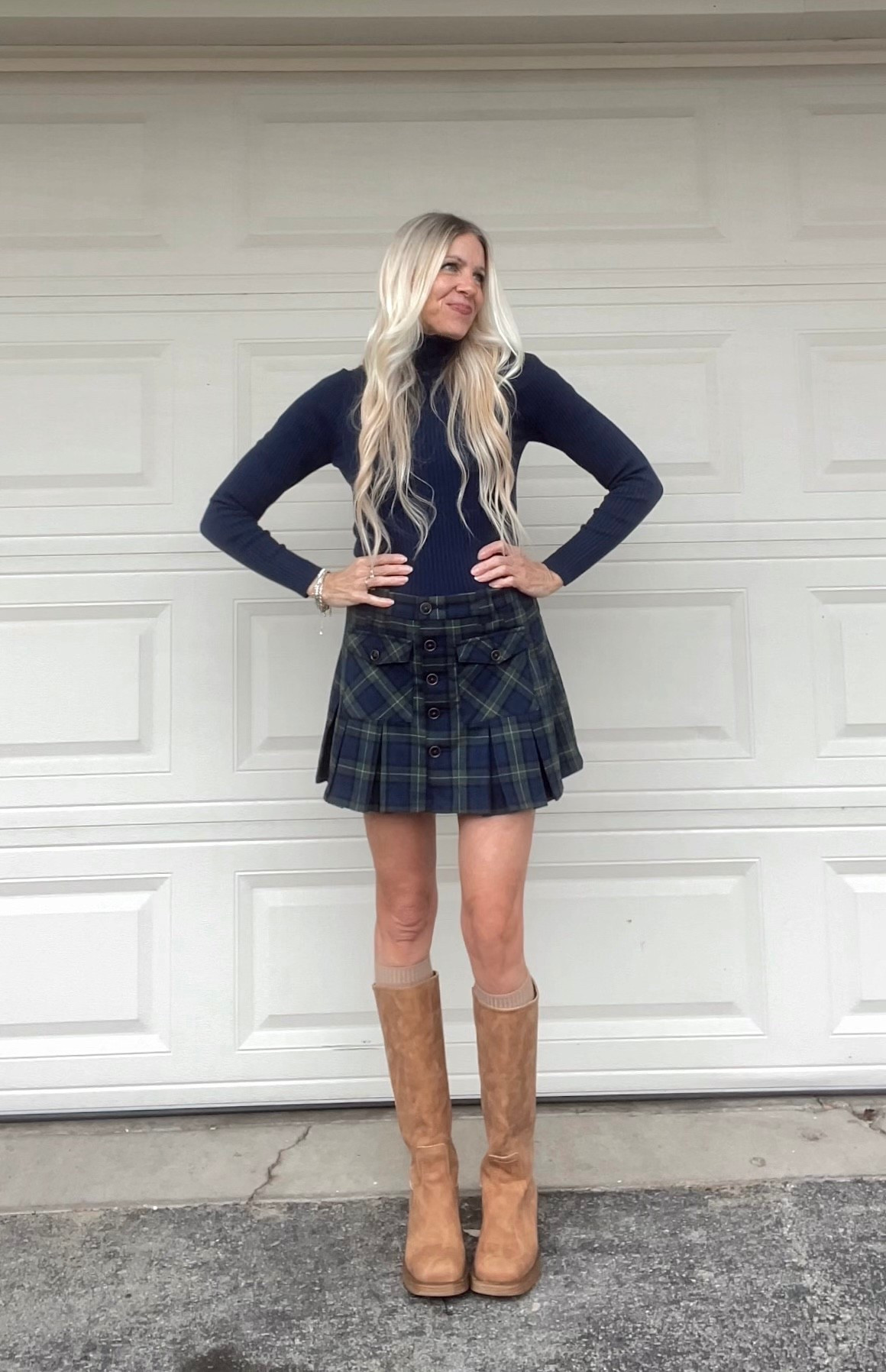 Plaid skirt & turtleneck sweater 

 #plaid #skirt #trending #outfit 

#LTKOver40 #LTKootd #LTKFindsUnder50