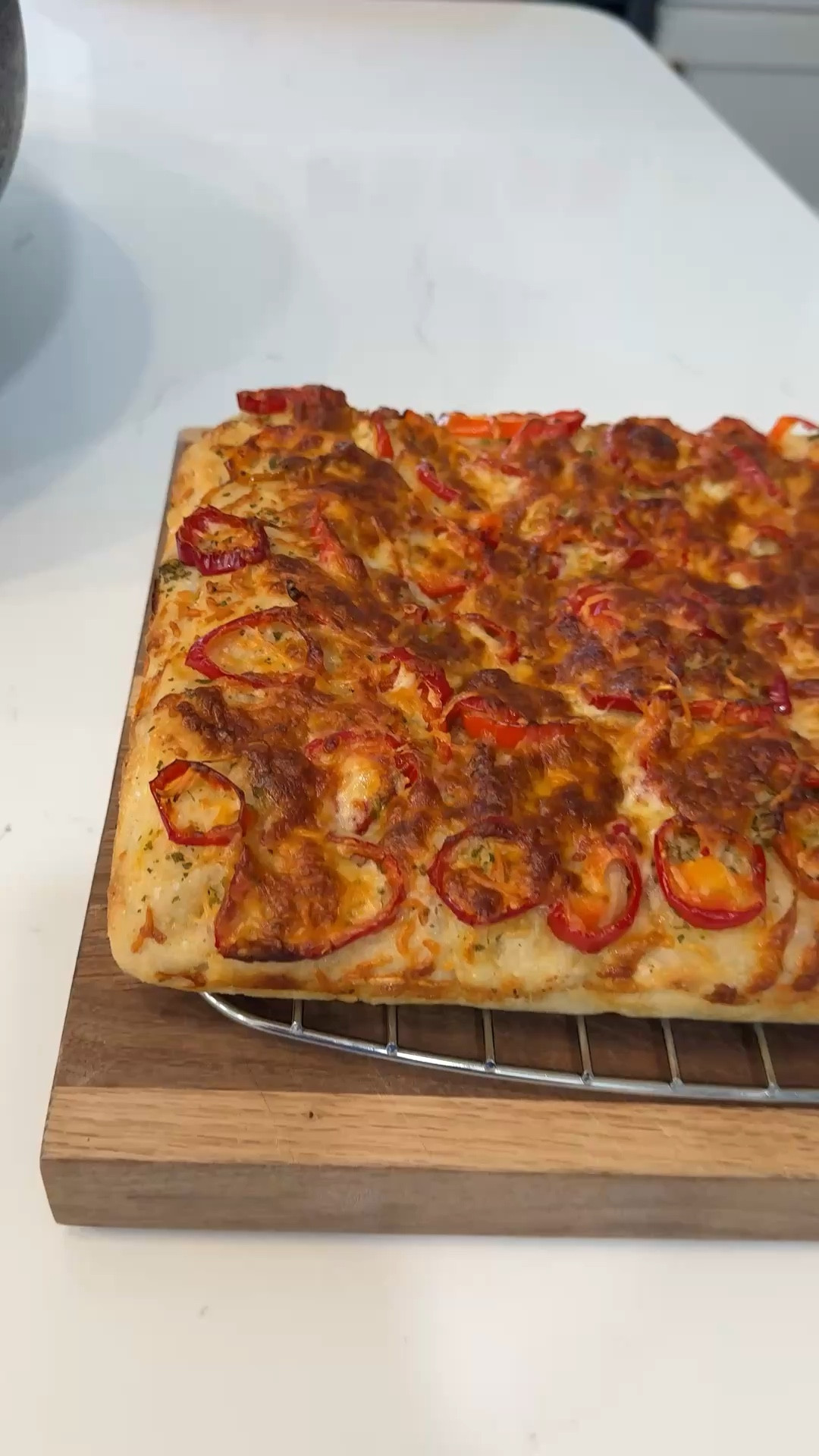 Today’s Bake is a new recipe. It is a garlic and butter stuffed sourdough focaccia with Fresno chilis, pepper jack cheese, and Parmesan on top. 

#LTKfoodie #LTKdayinmylife #LTKvlog