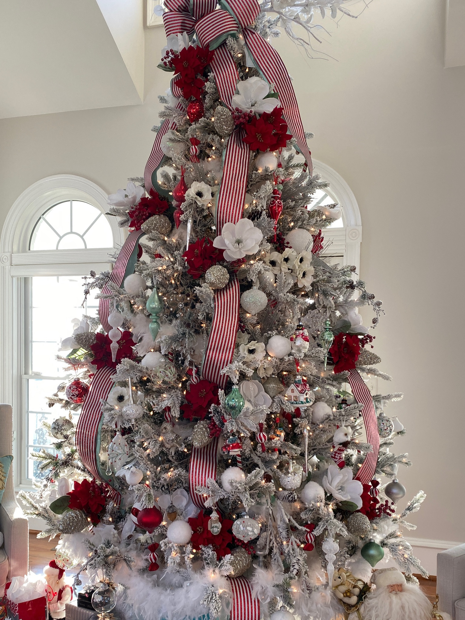 Christmas in July continues. Check out my YouTube video for 12 Christmas tree themes. This flocked lighted tree is magnificent and on sale!!

#LTKSeasonal #LTKStyleTip #LTKHome