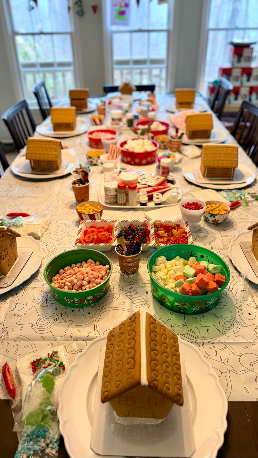Our annual gingerbread house party 🎄🍬
This tradition started when my kids were little, and now I get to enjoy it with the grandbabies too — pure Christmas magic every single year.

I’m linking all of our favorite gingerbread house supplies, candy bowls, and the little Mickey Christmas train we added this year (a HUGE hit!).

Pro tip: buy the prebuilt gingerbread houses. Just trust me on this one 😉 It makes the whole day easier, especially with littles.

We ended the night with the cutest Danny Go dance party in the living room — the perfect finale to a fun, sugar-filled day. ❤️

#gingerbreadhouseparty #holidaytraditions #christmaswithkids #familychristmas #hostessideas #kidfriendlychristmas #holidaypartyideas #christmascrafts #gingerbreaddecorating #prebuiltgingerbreadhouse #christmastablescape #puffervest #rugstyle #perfumeedit #ltkholiday #ltkhome #ltkfamily #ltkkids #ltkseasonal #bessieandco

#LTKKids #LTKHoliday #LTKSeasonal