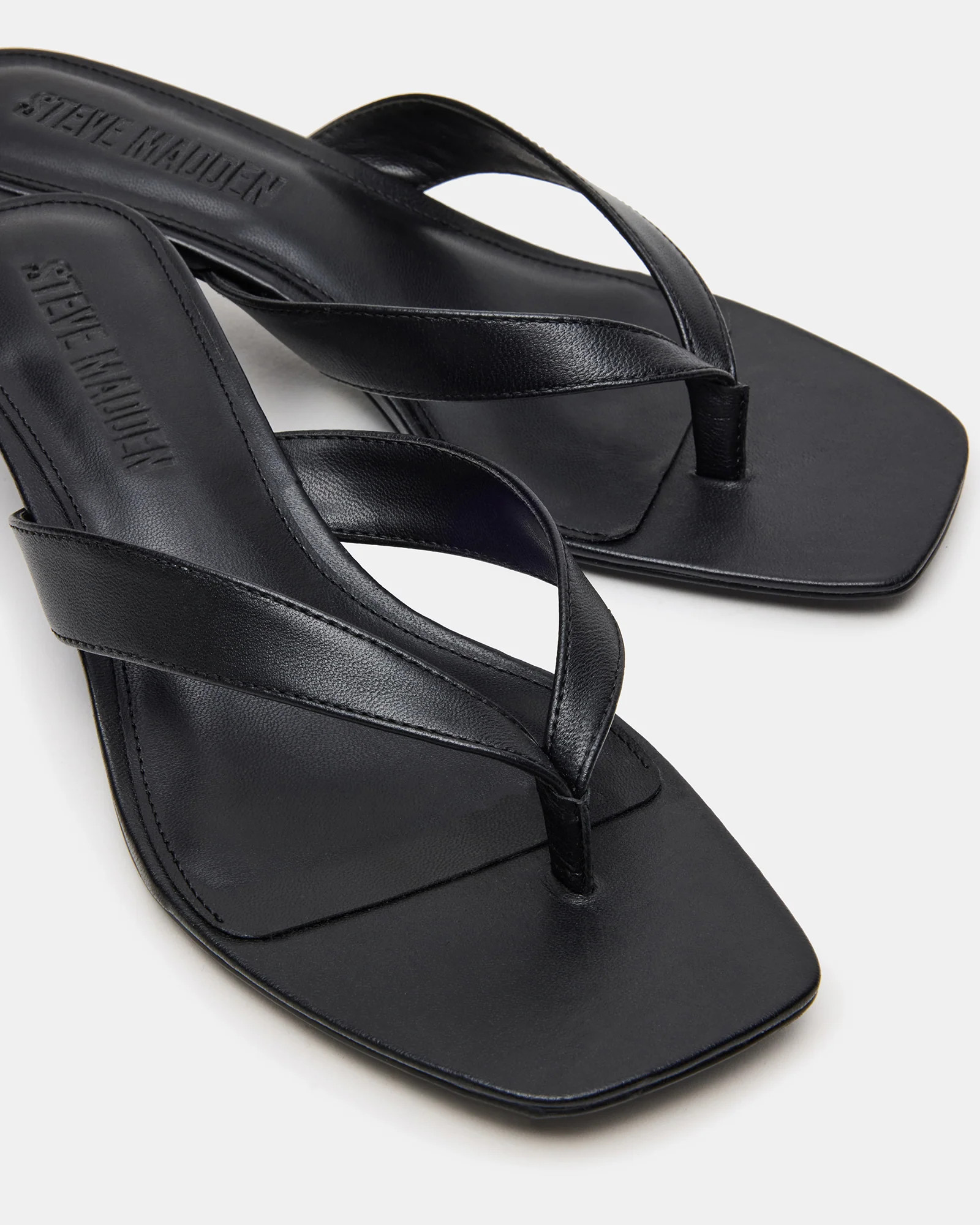 TRACIE Black Leather Thong Strap Women's Kitten Heel | Steve Madden (US)