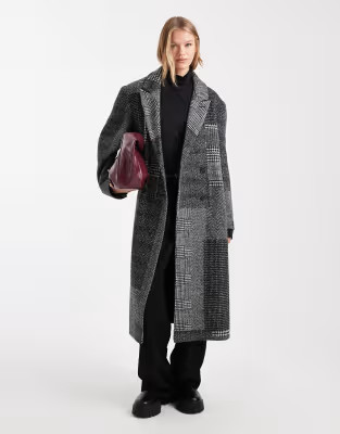 ASOS DESIGN oversized dad coat in black and white splice check | ASOS (Global)