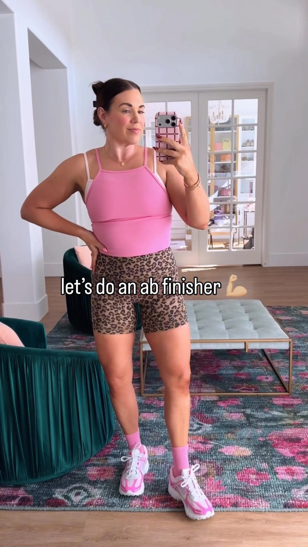 curvy midsize workout outfit in action! wearing size 10 in layered pink tank and size 8 on leopard shorts 

#LTKActive #LTKfitnessgoals #LTKMidsize