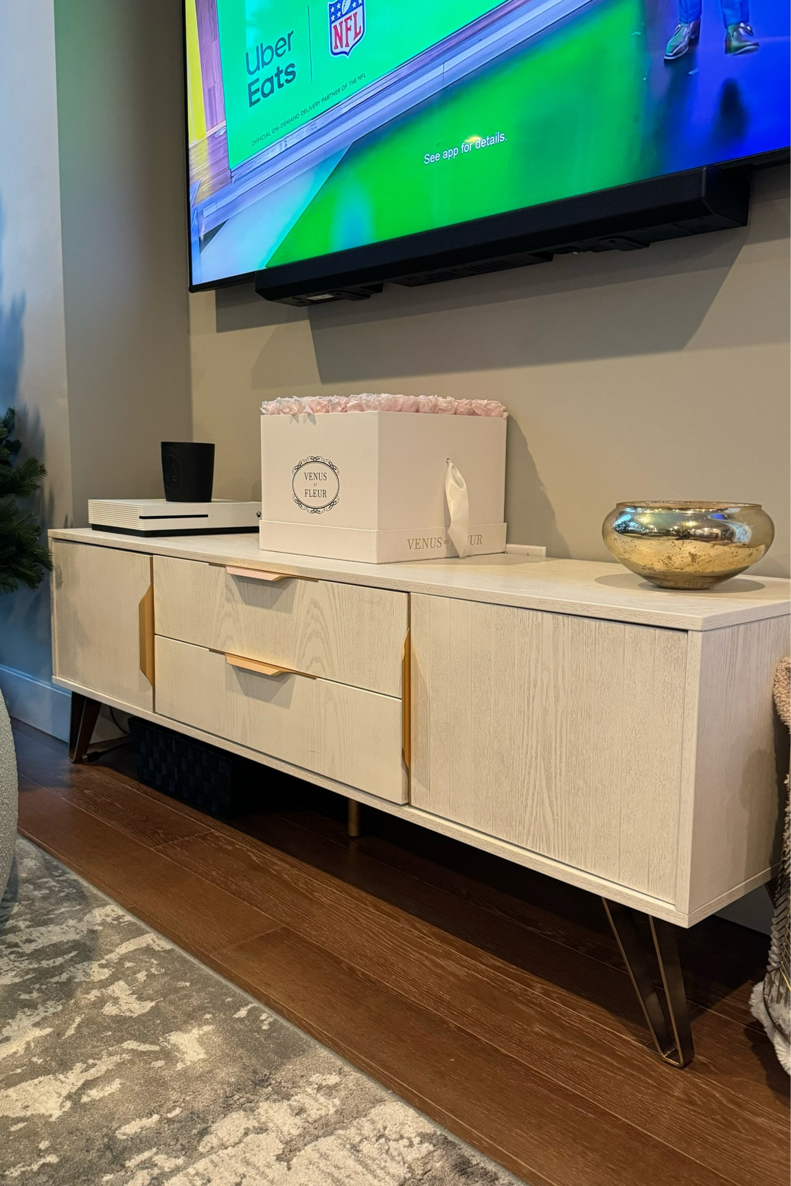 Gorgeous grey tv console with gold details! 

#LTKsalealert #LTKhome