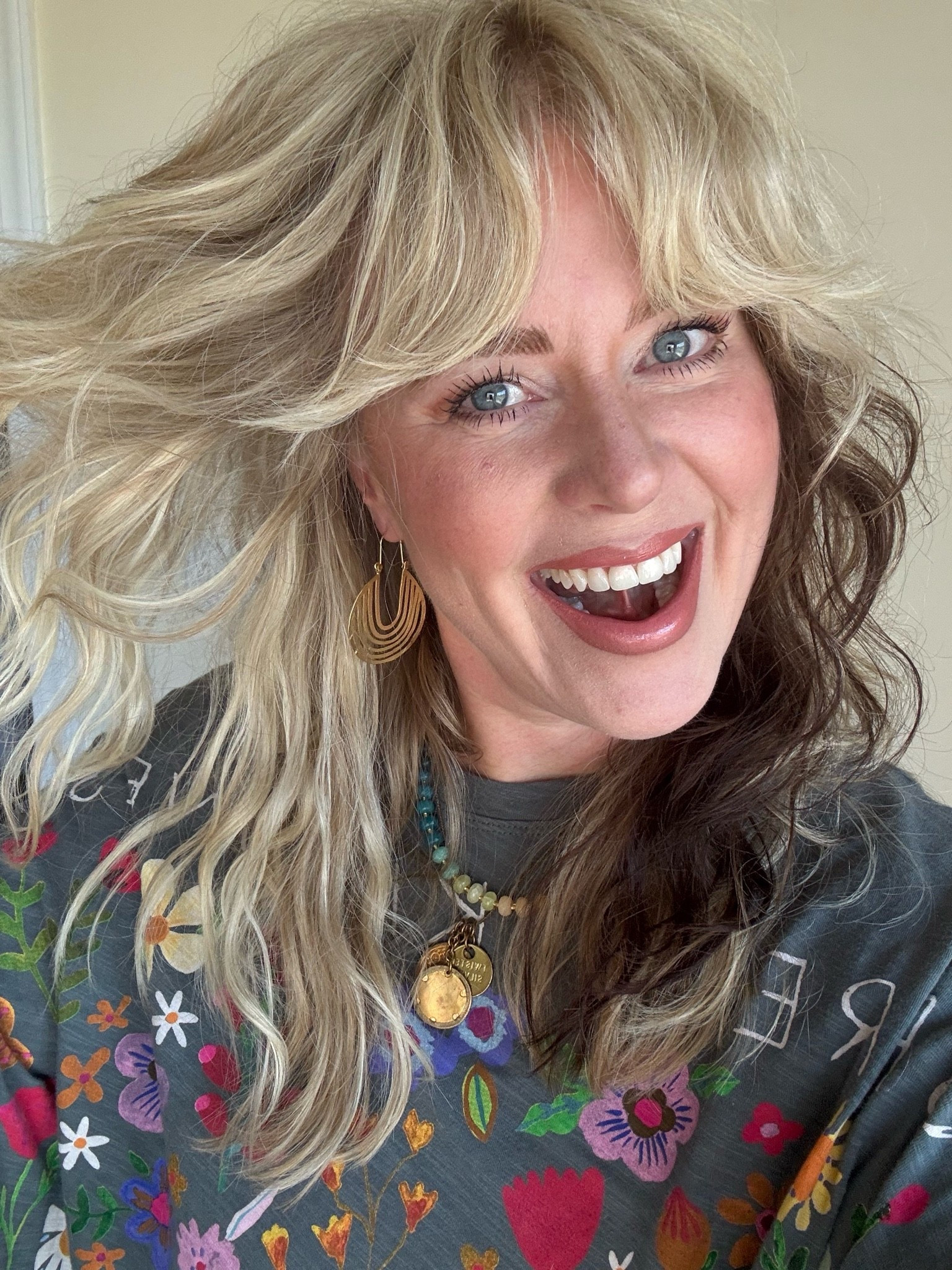 I love this tee and these earrings from @Natural Life 
🌸This tee is a one size 
✨My brass necklace is @twistedsilver (I can’t link here) save there with code MANDIE20

#LTKootd #LTKOver40 #LTKBeauty