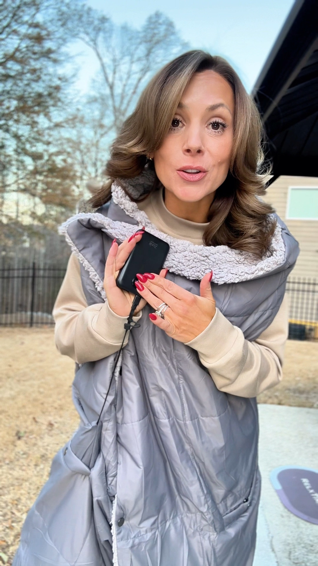 Cold weather used to win every time — not anymore.

This wearable heated blanket is cordless, rechargeable, and comes with the battery pack included, which means no outlet required. It has 8 heating pads, 3 heat settings, and heats up fast with the push of a button.

You can wear it or zip the arms up and use it as a regular heated blanket. Perfect for kids’ sports, working from home, long car rides, travel, or staying cozy on the couch. The Sherpa lining is unbelievably soft, and the oversized pockets are clutch.

As a sports mom, this is coming with me to every cold lacrosse game. Warm, functional, and actually practical — which is rare.

If you’re always freezing, this is one of those things you don’t realize you need until you have it. #heatedblanket
#winteressentials
#sportsmom
#momlife
#coldweather
#cozyseason
#winterfinds
#giftideasforwomen
#staywarm
#everydaycomfort