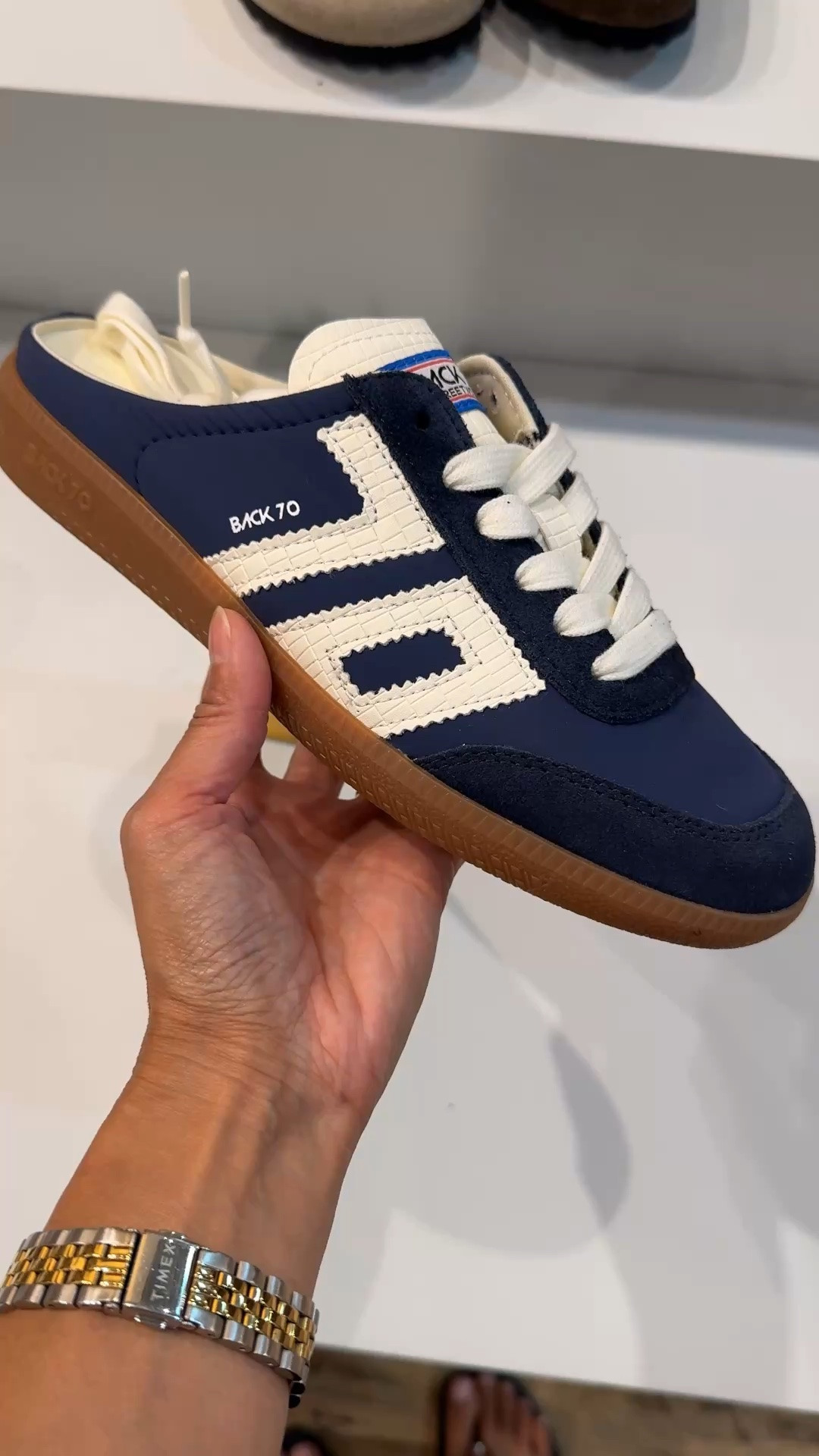 Chic navy blue color sneaker mules. Would be true to size for me. The color looks so good.

#LTKOver40
