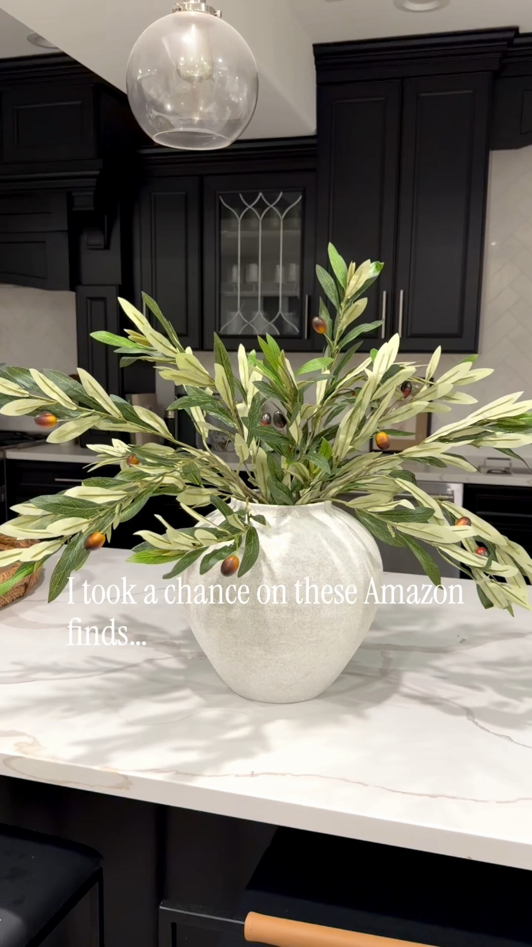 Still one of my favorite styling combinations. Vase + faux olive stems linked here. 🤍🌿

#LTKHome #LTKSaleAlert