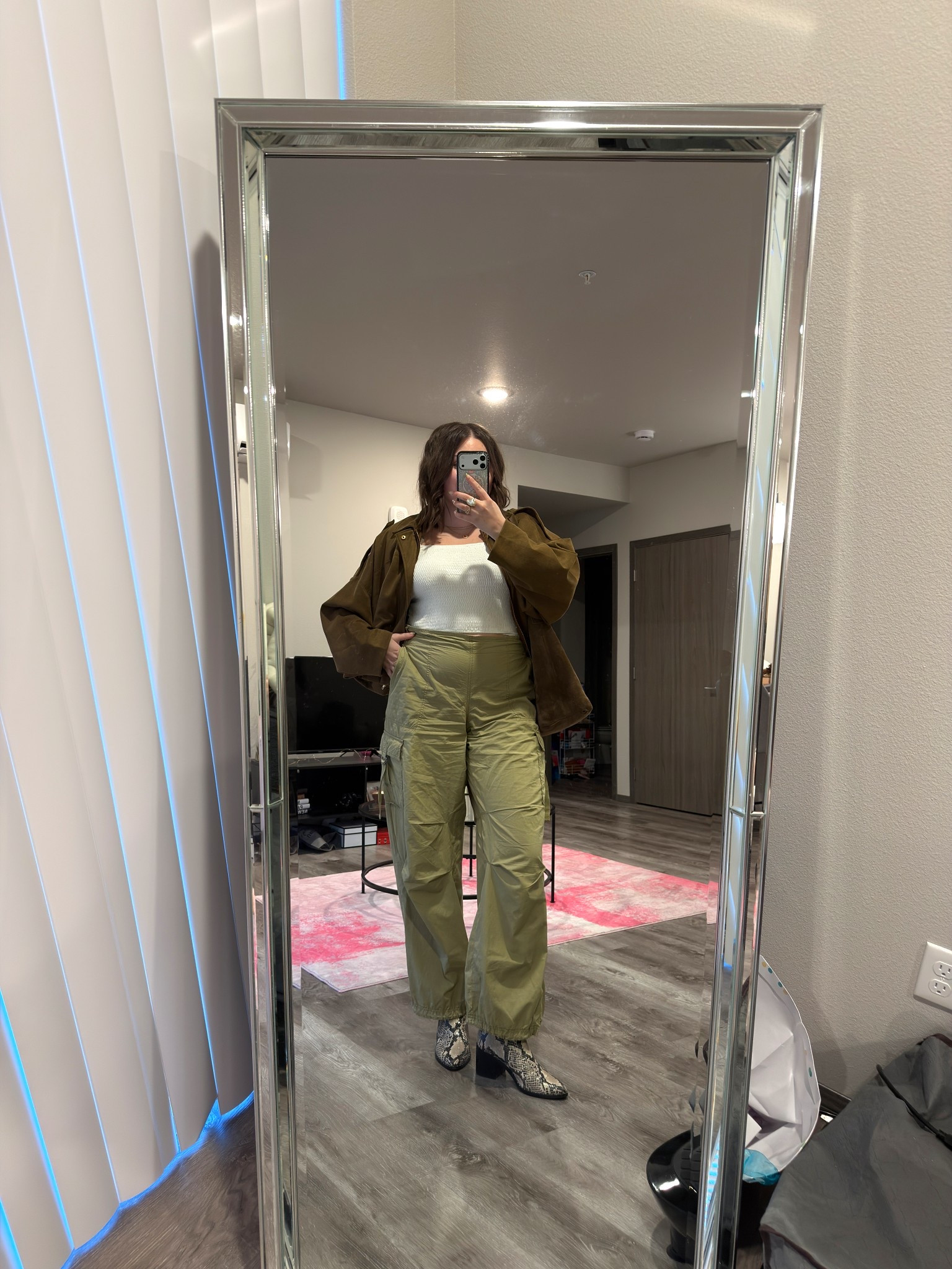 Cute and casual outfit for a girls night out! Loving the cargo trend right now and mixing it with suede 💚🤎

I’m wearing a L jacket, M top, L pants and size 9 boots

#LTKMidsize #LTKootd #LTKWorkwear