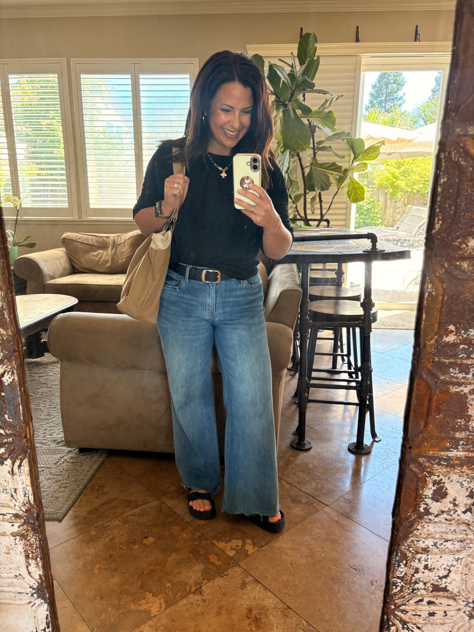 Effortless everyday look 🤍

My go-to combo lately—high-rise wide leg jeans + a simple black tee = easy, flattering, and pulled together in minutes. Added a belt, comfy slides, and a neutral tote to finish it off. Perfect for errands, school days, or casual dinners.

Everything linked in my LTK ✨

#LTKStyle #Over40Style #MomStyle #CasualOutfits #EverydayStyle #PetiteFashion #WideLegJeans #SimpleStyle #ClassicOutfits #LTKFinds

#LTKPetite #LTKmomlife #LTKOver40