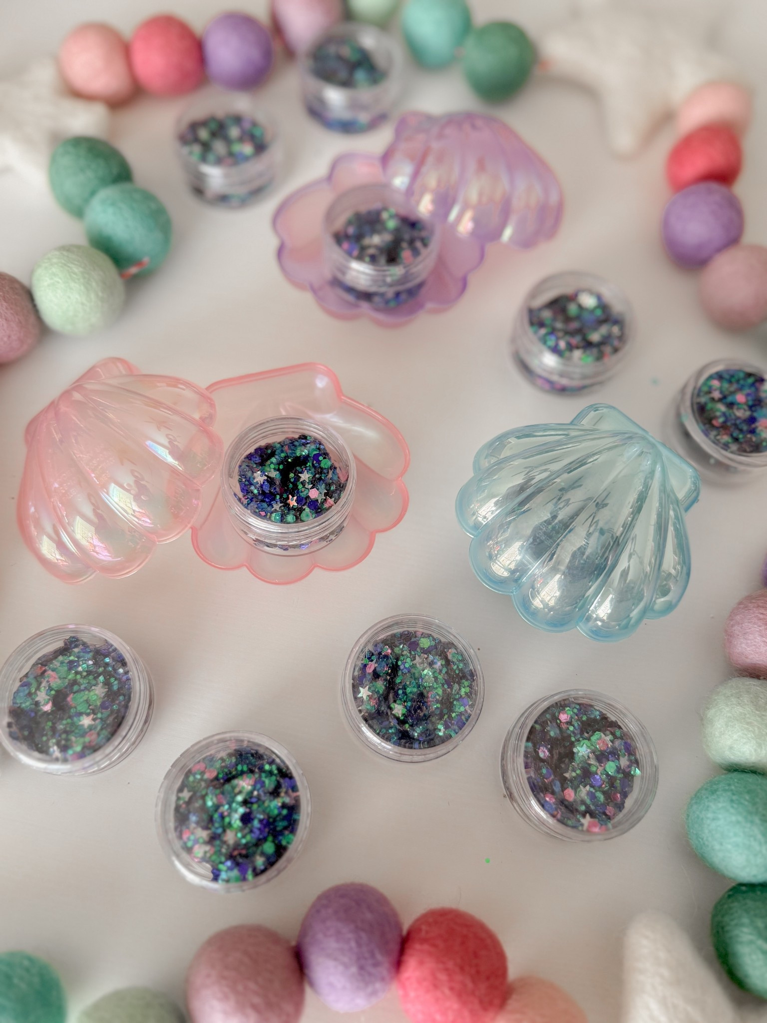 Mermaid face glitter party favors 🧜🏻‍♀️🐚🌊🩷 

#LTKFamily #LTKParties #LTKKids