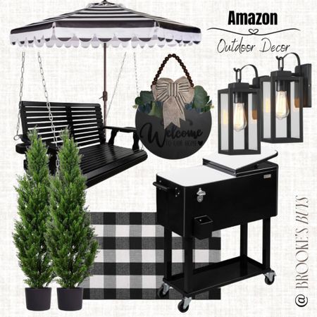 Outdoor decor for your porch or patio. Love this ergonomic porch swing, porch lights and ice chest  

#LTKfindsunder100 #LTKhome #LTKU