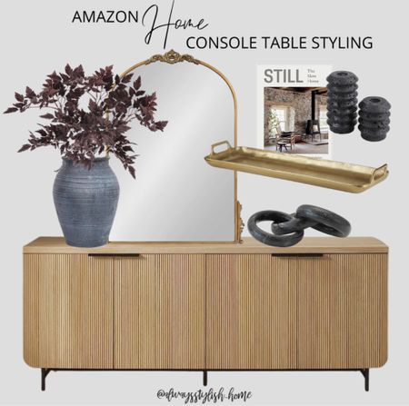 Amazon Home - console table styling - entry way styling - fluted console table, buffet table, sideboard, plum faux stems, black rustic vase, pretty gold mirror, candlestick holder, travertine, gold tray, coffee table book, marble chain link

#LTKhome