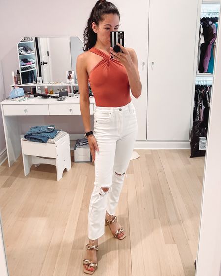 New bodysuit and white distressed jeans from lulus. Love this for an end of summer vacation look. 

#LTKtravel #LTKSeasonal #LTKunder50