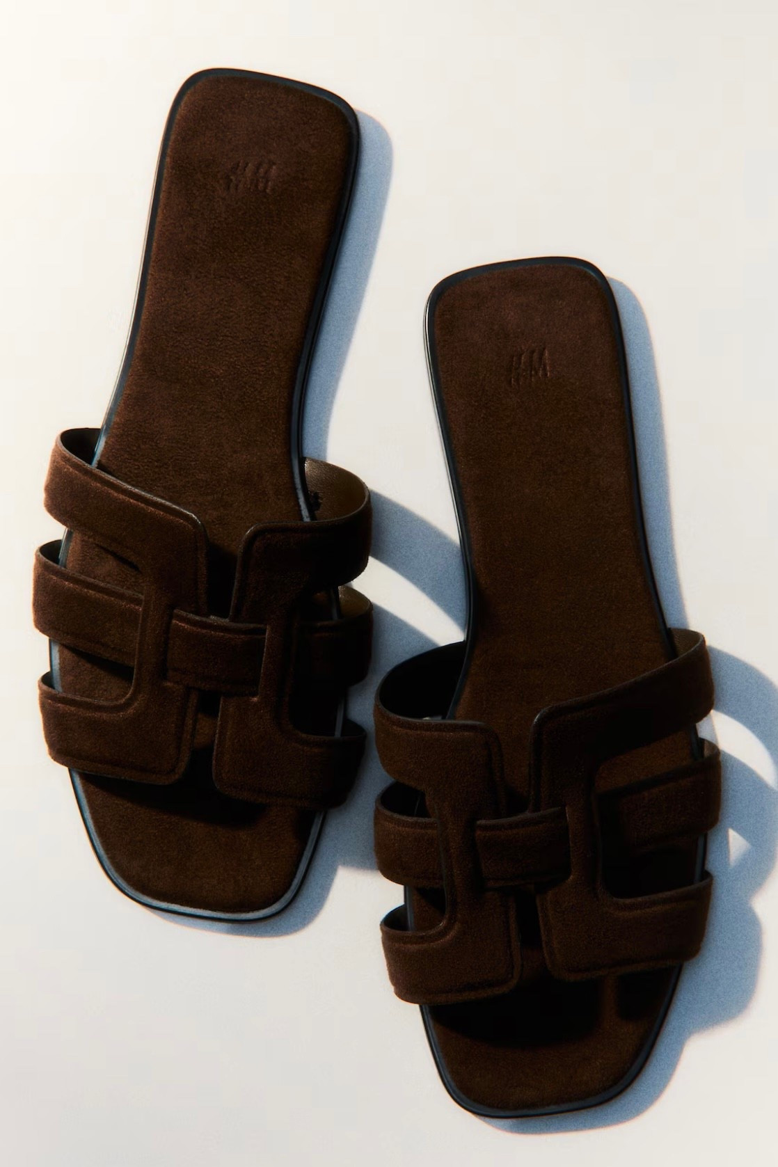 Brown leather slide sandals
No-fuss shoes for days when you need something quick and comfortable. Easy slip-on design saves time. Cushioned sole helps with all-day wear.

#LTKstyletip #LTKshoes