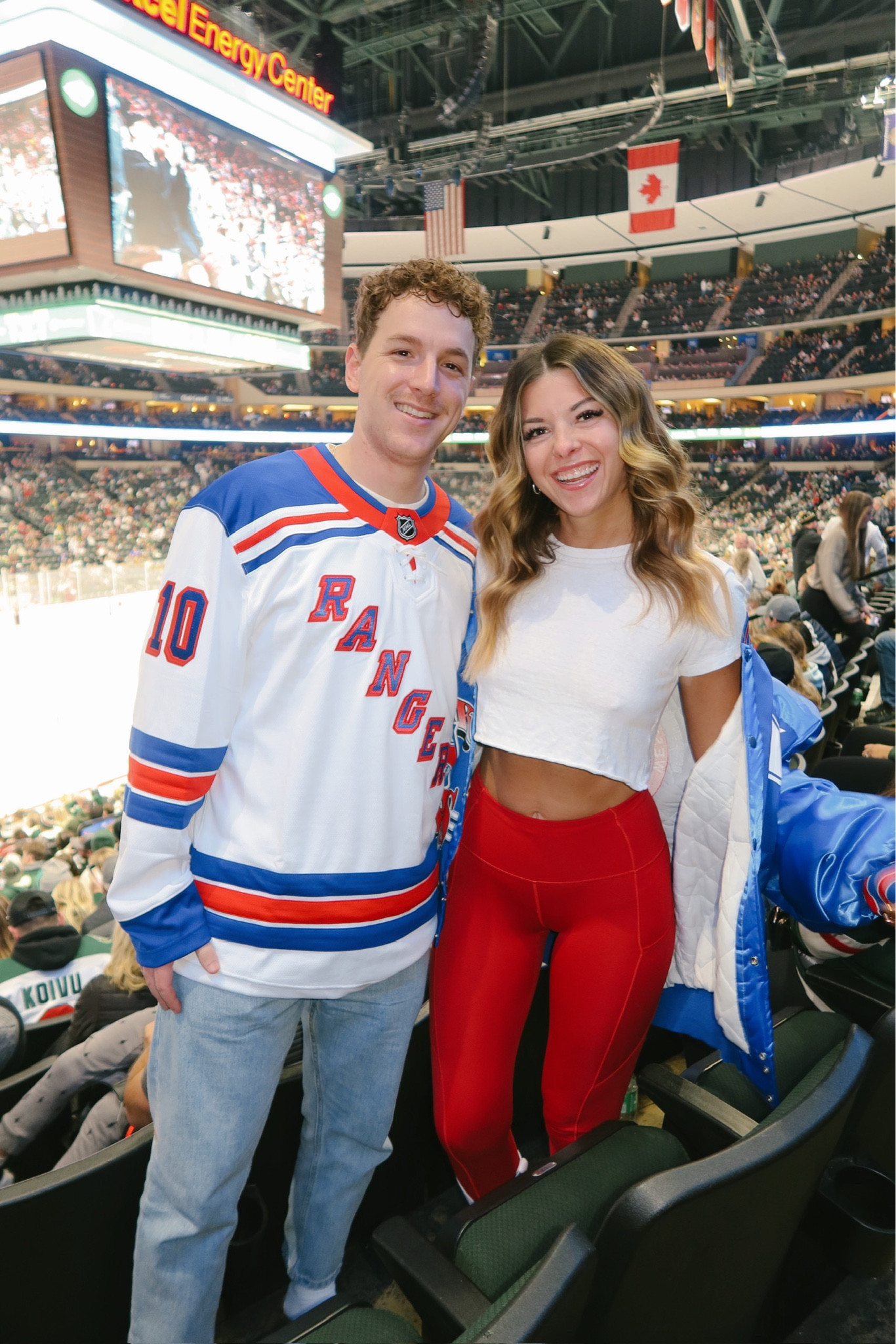 Hockey game day. Rangers jersey and rangers bomber jacket, white revolve crop top with lululemon leggings and white cowboy boots. - wearing my usual smalls

#LTKshoecrush #LTKSeasonal #LTKstyletip